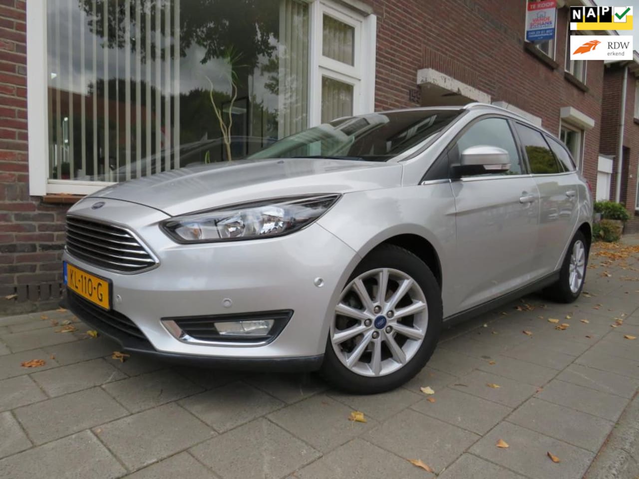 Ford Focus Wagon - 1.0 Titanium 70 Dkm. Clima Cruise Contr. - AutoWereld.nl