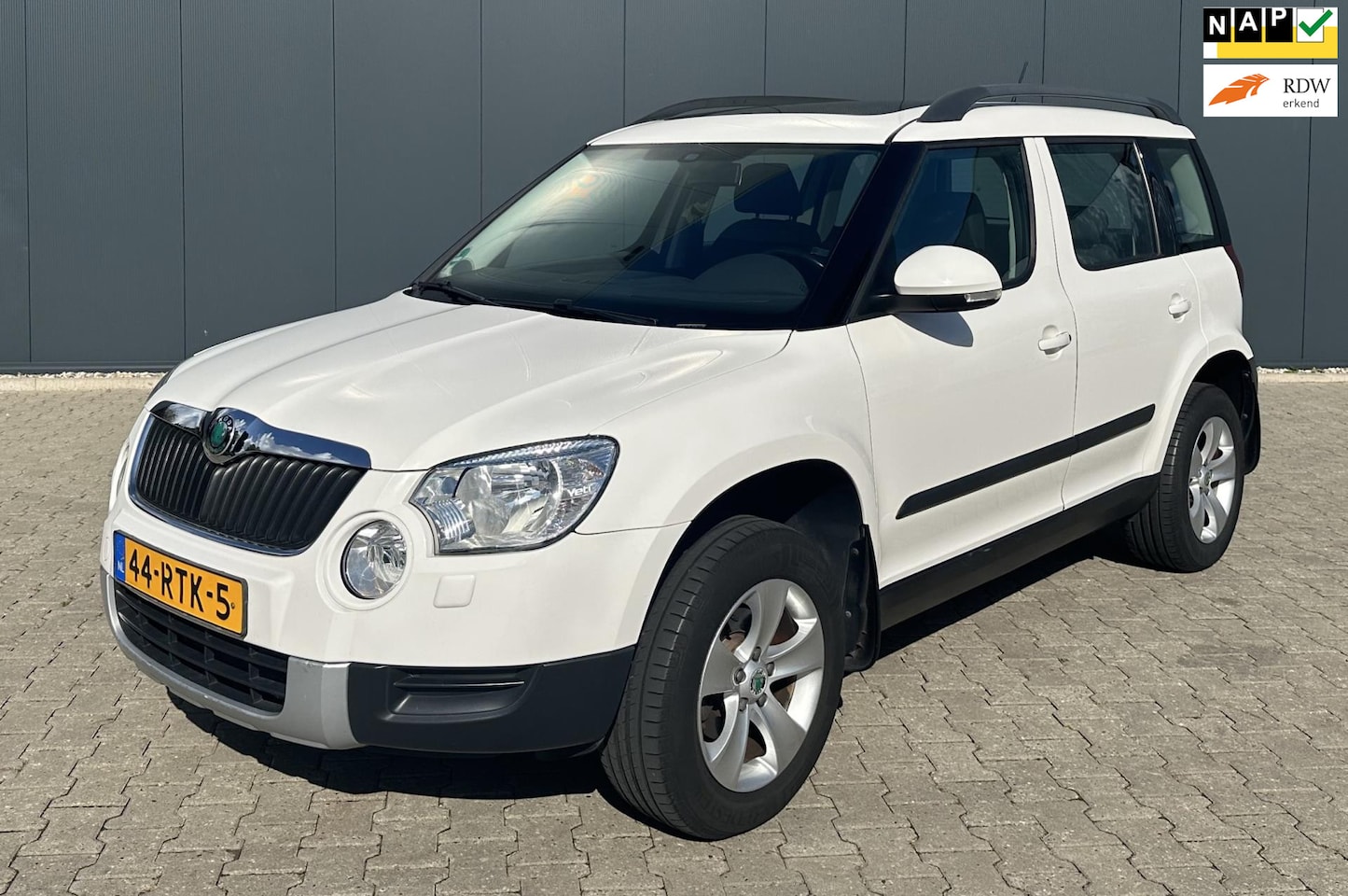 Skoda Yeti - 1.2 TSI Ambition Airco Cruise Navi Panoramadak Trekhaak - AutoWereld.nl