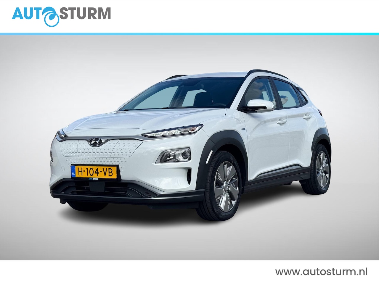 Hyundai Kona Electric - EV Comfort 64 kWh SoH 96% | Navigatie | Camera | Adapt. Cruise Control | Keyless Entry | P - AutoWereld.nl