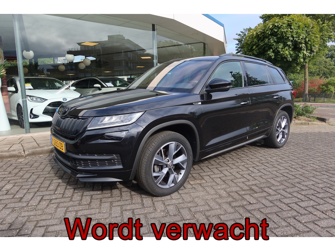 Skoda Kodiaq - 1.5 TSI 150PK AUTOMAAT NL-Auto Sportline I TREKHAAK - AutoWereld.nl