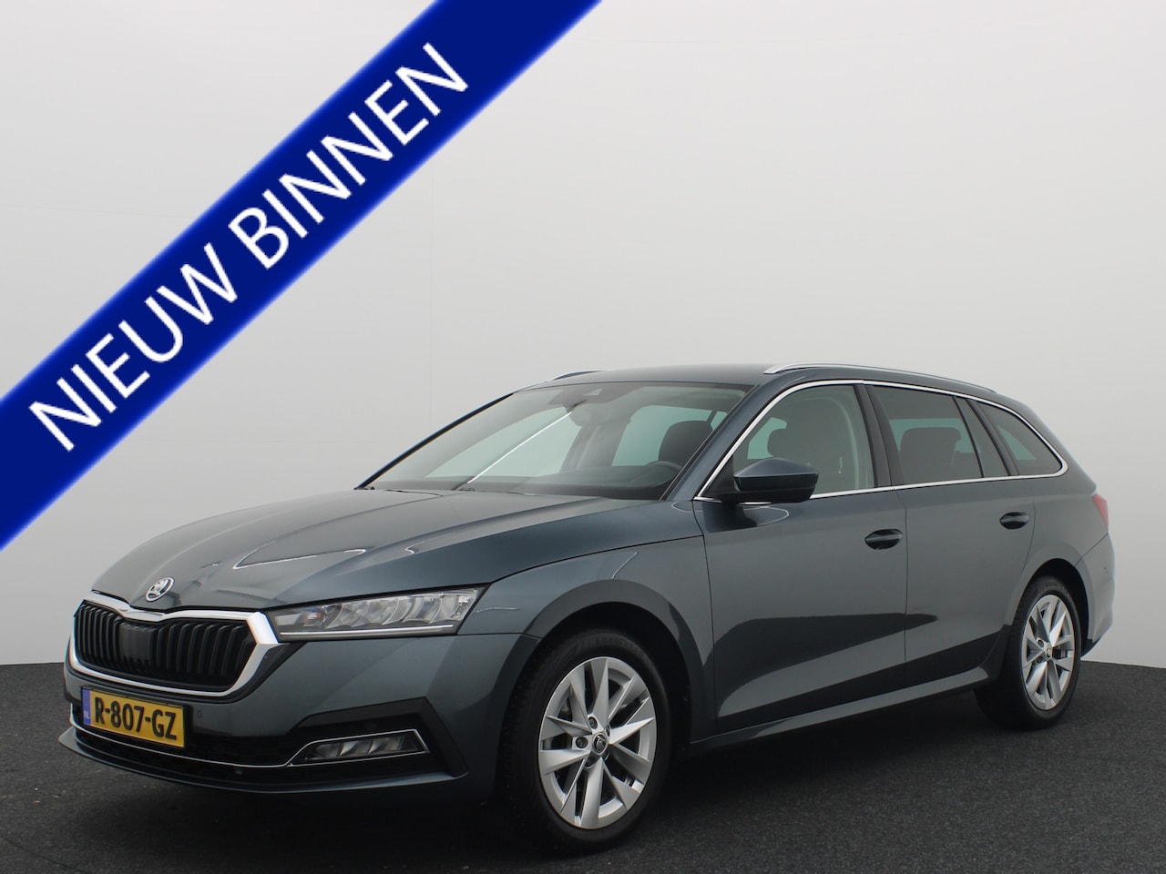 Skoda Octavia Combi - 1.5 e-TSI 150PK Business Edition Plus AUTOMAAT / HUD / VIRTUAL / STOELVERW / CAMERA / DAB+ - AutoWereld.nl