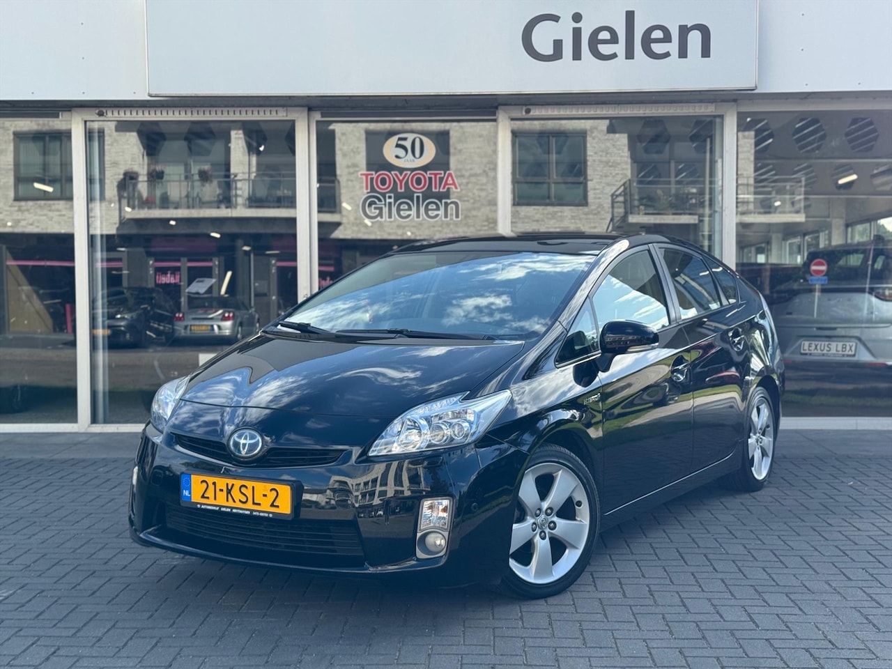 Toyota Prius - 1.8 Full Hybrid Executive | Solar Roof, Schuifdak, Leer, JBL, Navigatie, Stoelverwarming, - AutoWereld.nl