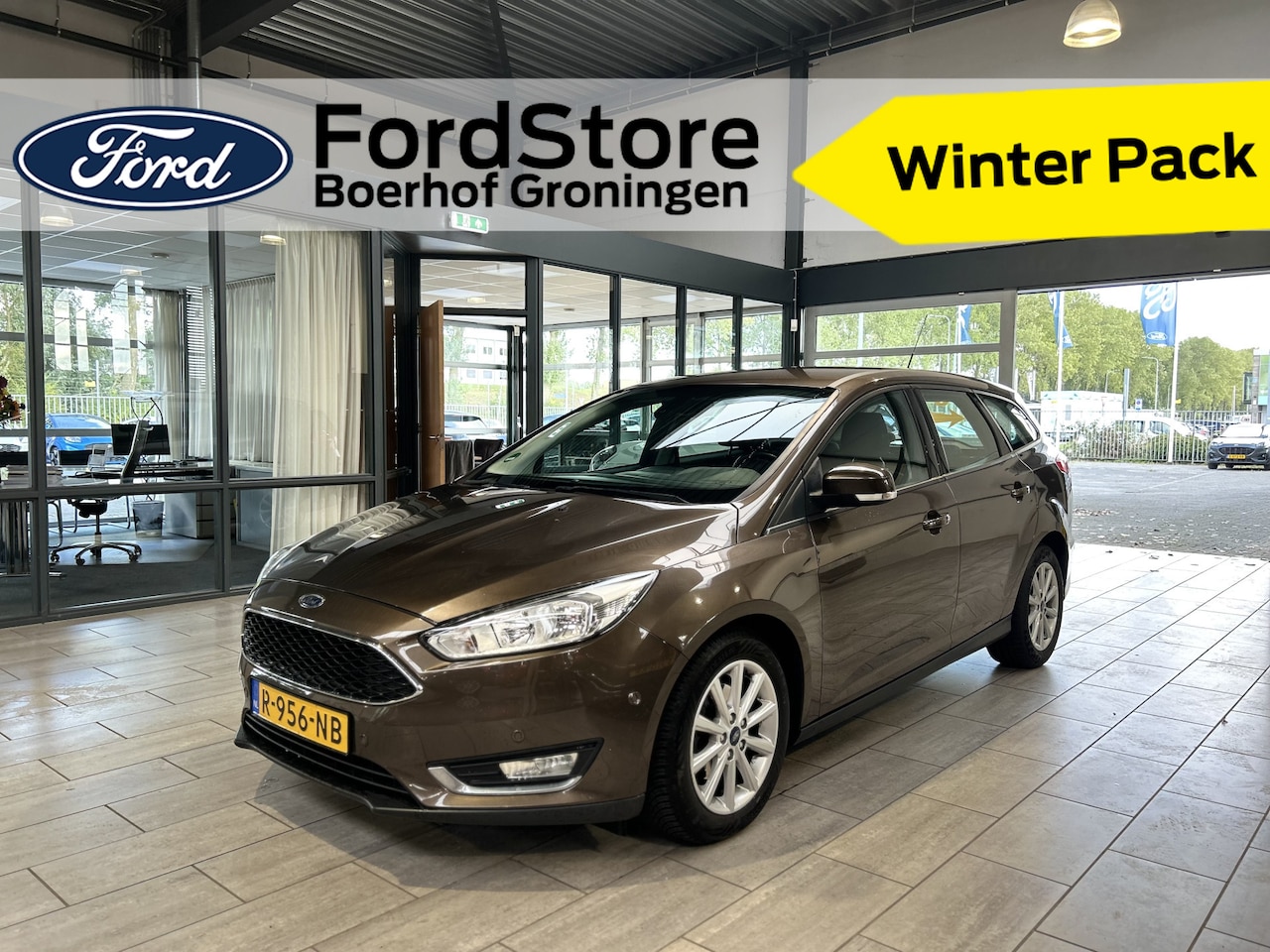 Ford Focus Wagon - EcoBoost 100pk Trend | Winterpack | 100% dealer onderhouden | Cruise | Navi | Parkeer assi - AutoWereld.nl