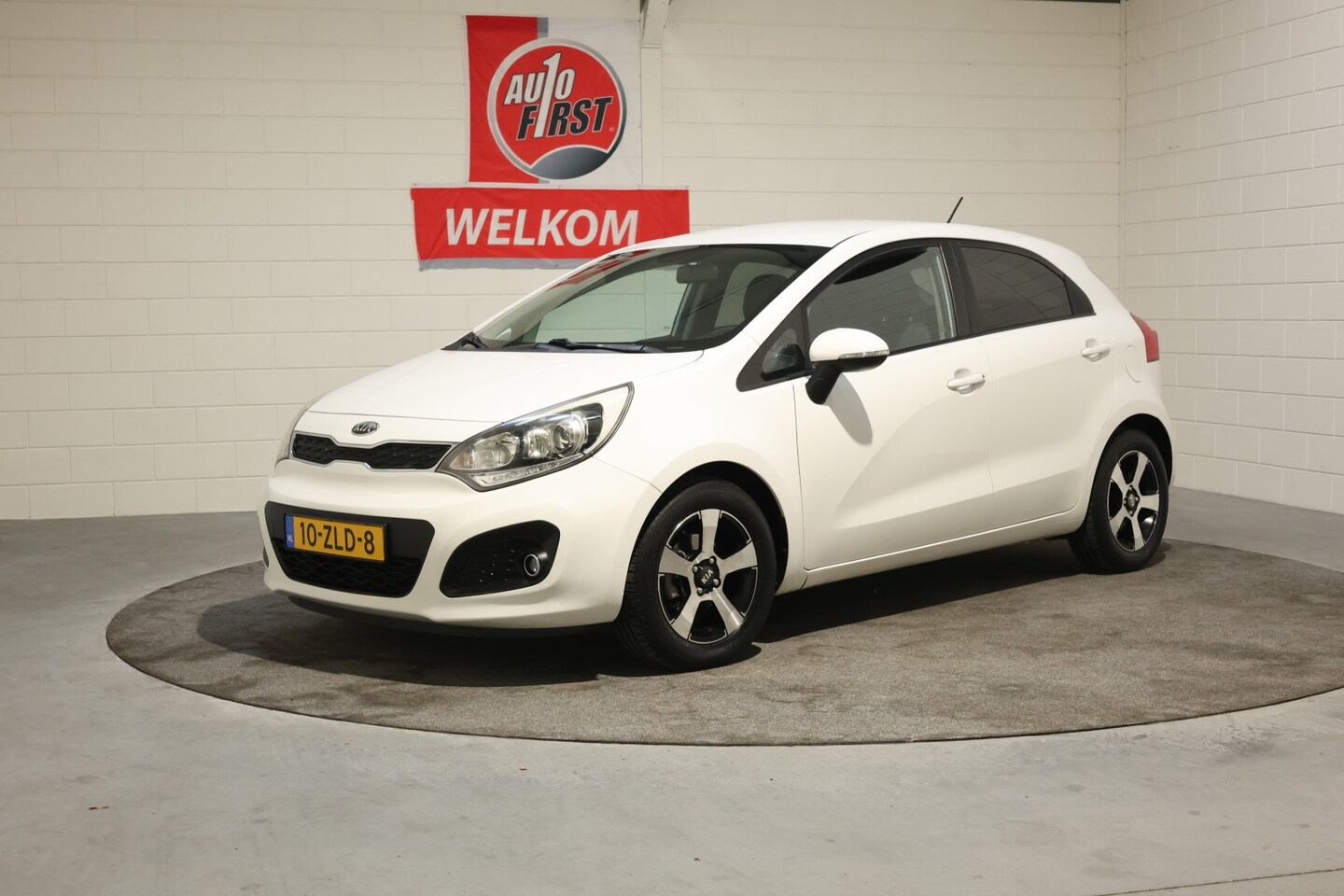 Kia Rio - 1.2 CVVT Design Edition 1.2 CVVT Design Edition, Airco, Cruise control, 1e eigenaar, Parkeersensoren achter, Isofi - AutoWereld.nl