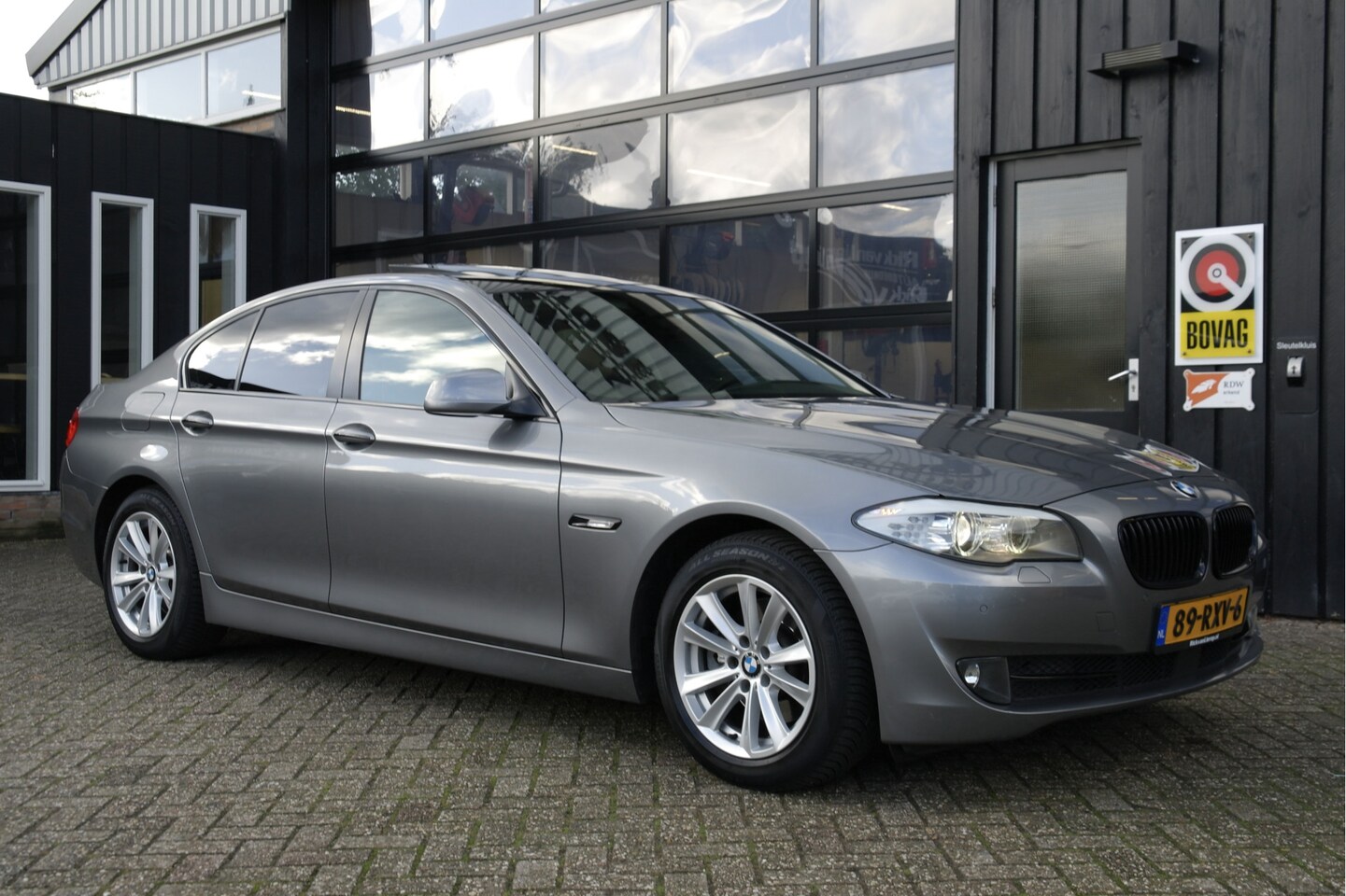 BMW 5-serie - 523i High Executive | NL-Auto | Leder | Cruise | Clima - AutoWereld.nl