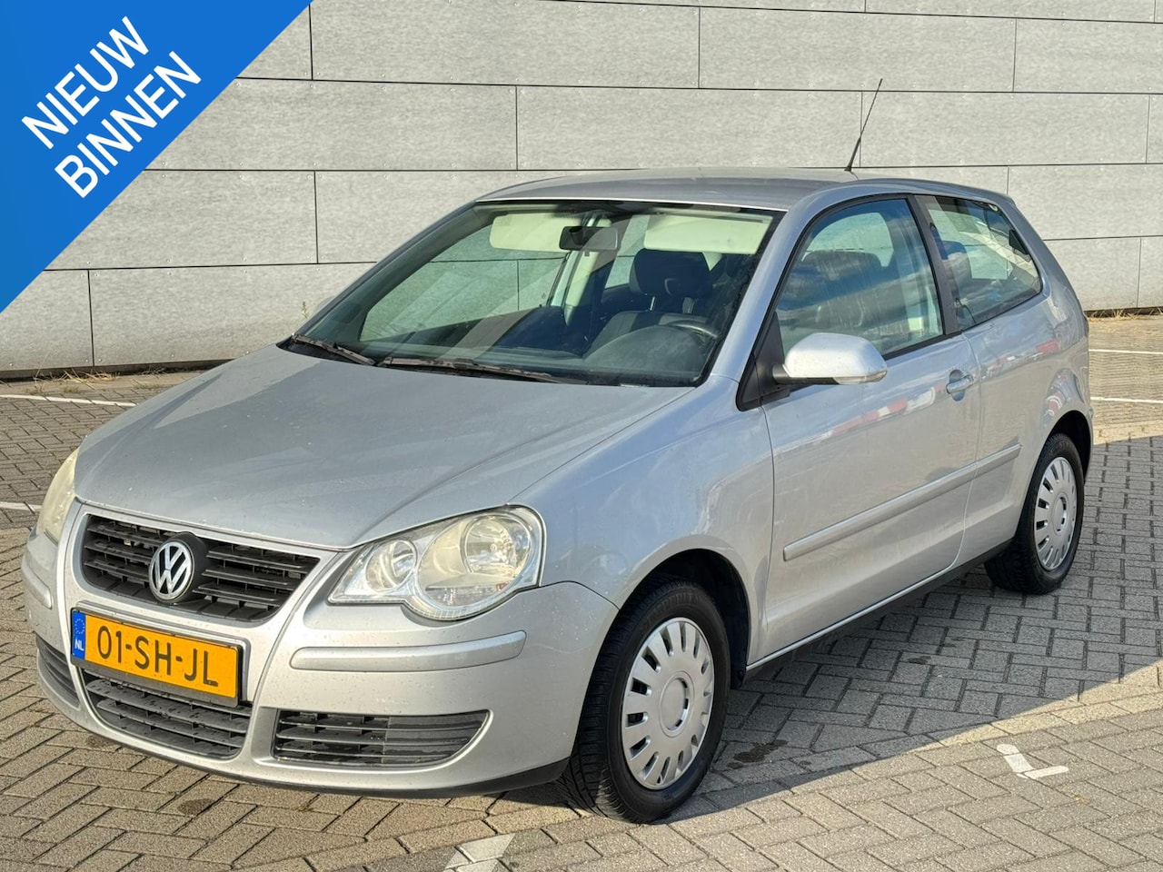 Volkswagen Polo - 1.2-12V Optive Airco/NAP/Trekhaak - AutoWereld.nl