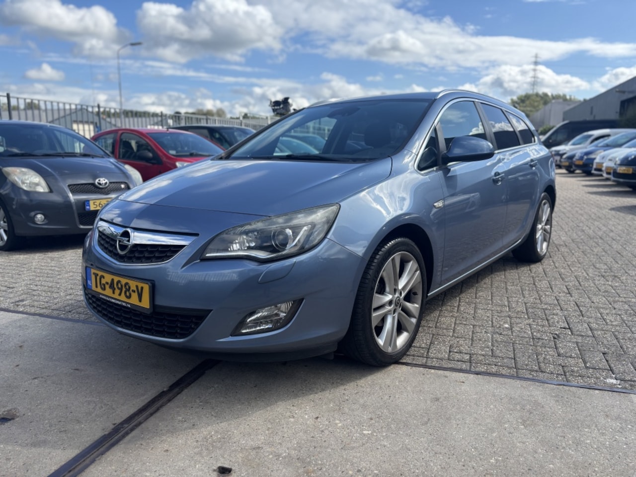 Opel Astra Sports Tourer - 1.4 Turbo Edition CLIMA!NAVI! - AutoWereld.nl