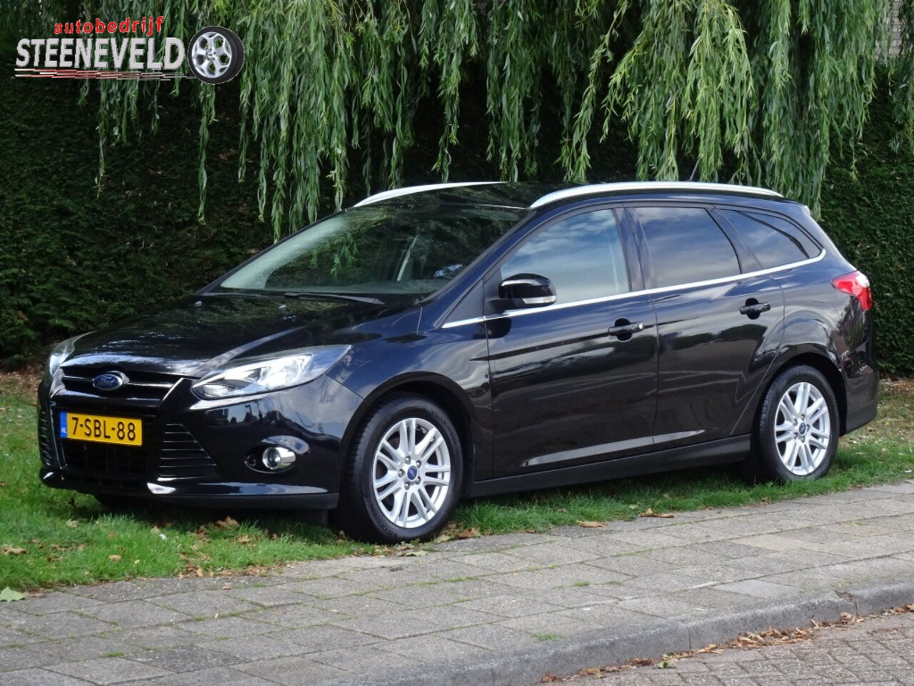 Ford Focus Wagon - 1.0 125pk Titanium met Navi en Trekhaak - AutoWereld.nl