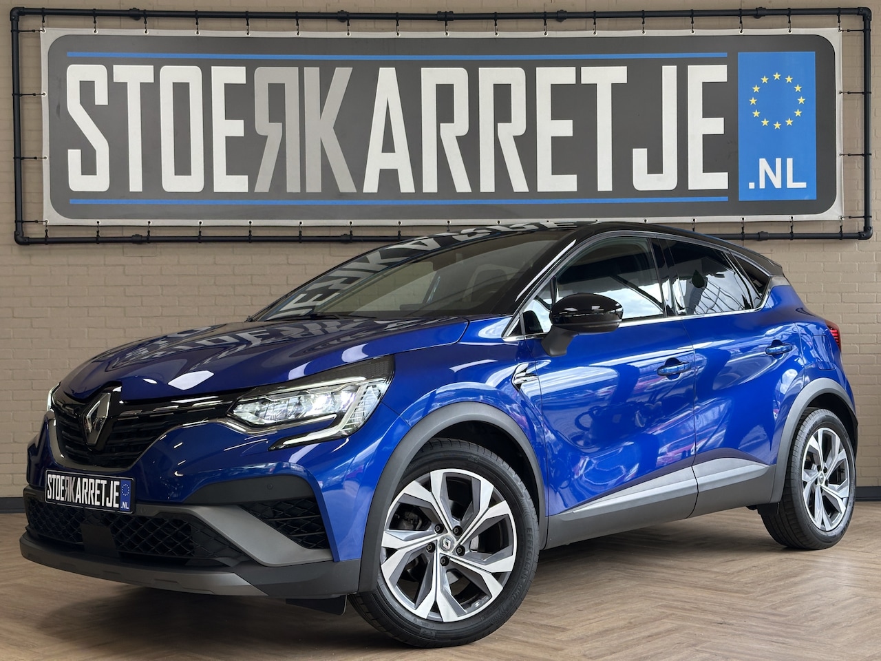 Renault Captur - 1.6 E-Tech Hyb RS-Line 160 | Groot Navi | 18" | Carplay | Stoelverwarming | Camera | 100% - AutoWereld.nl