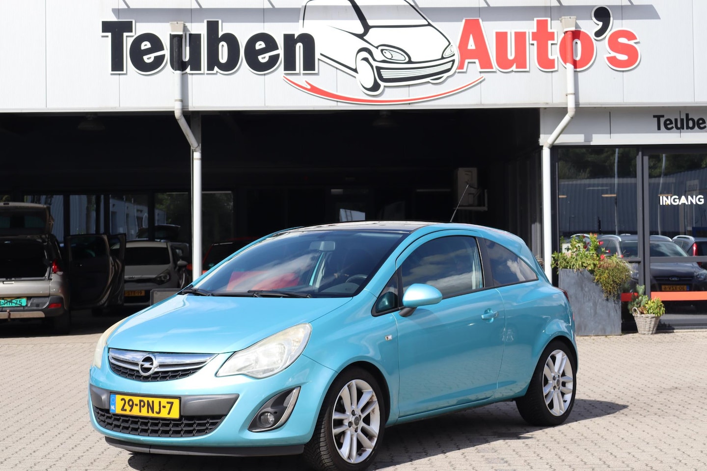 Opel Corsa - 1.4-16V Color Edition Airco, Radio cd speler, Cruise control, Lichtmetalen wielen - AutoWereld.nl
