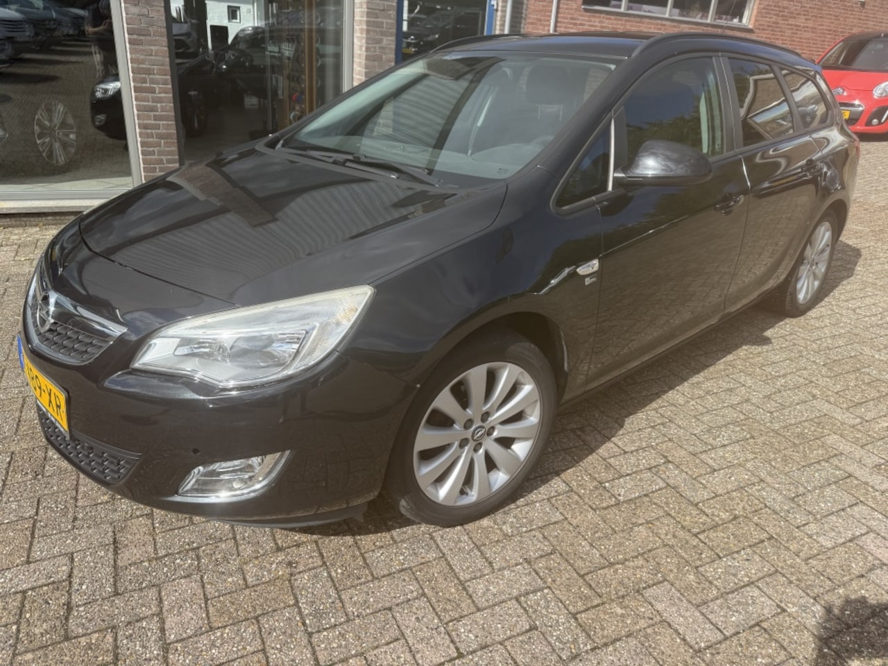 Opel Astra Sports Tourer - 1.4 Turbo Sport 1.4 Turbo Sport - AutoWereld.nl