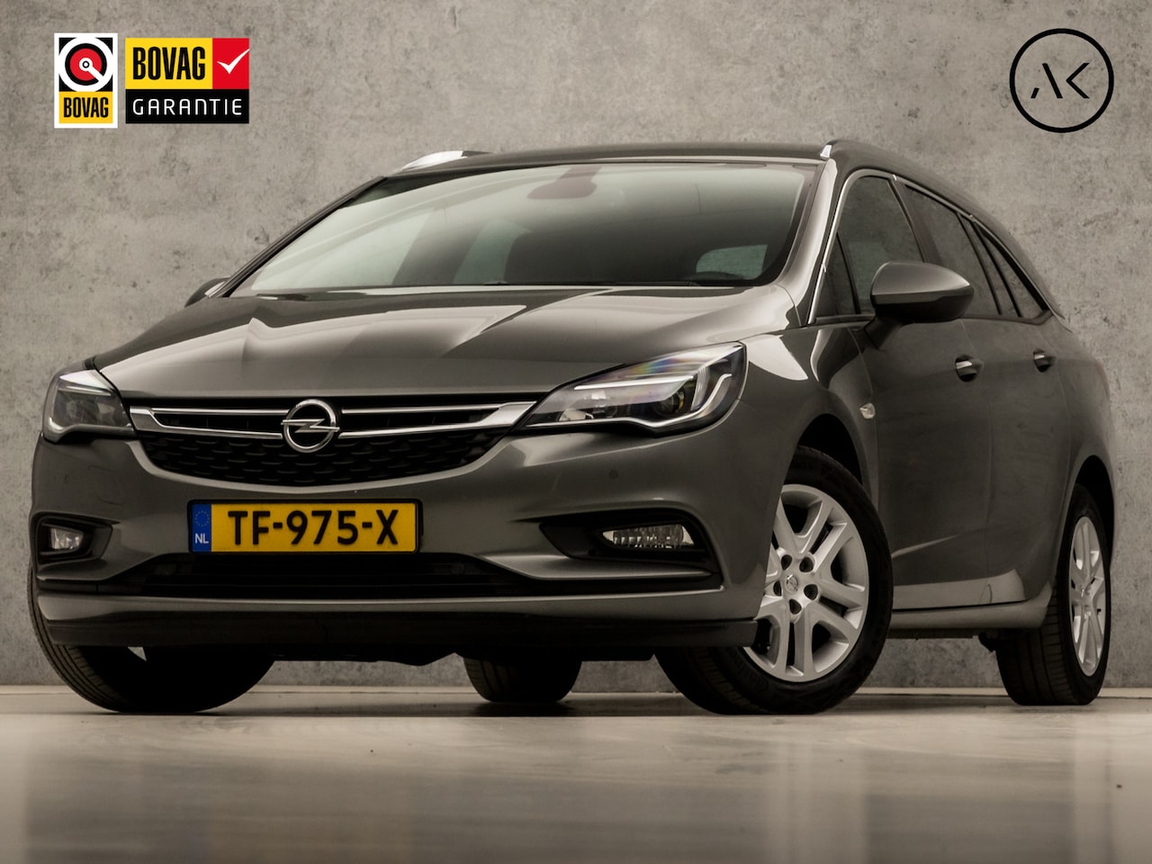 Opel Astra Sports Tourer - 1.0 Luxury (APPLE CARPLAY, GROOT NAVI, GETINT GLAS, XENON, SPORTSTOELEN, BLUETOOTH, CRUISE - AutoWereld.nl