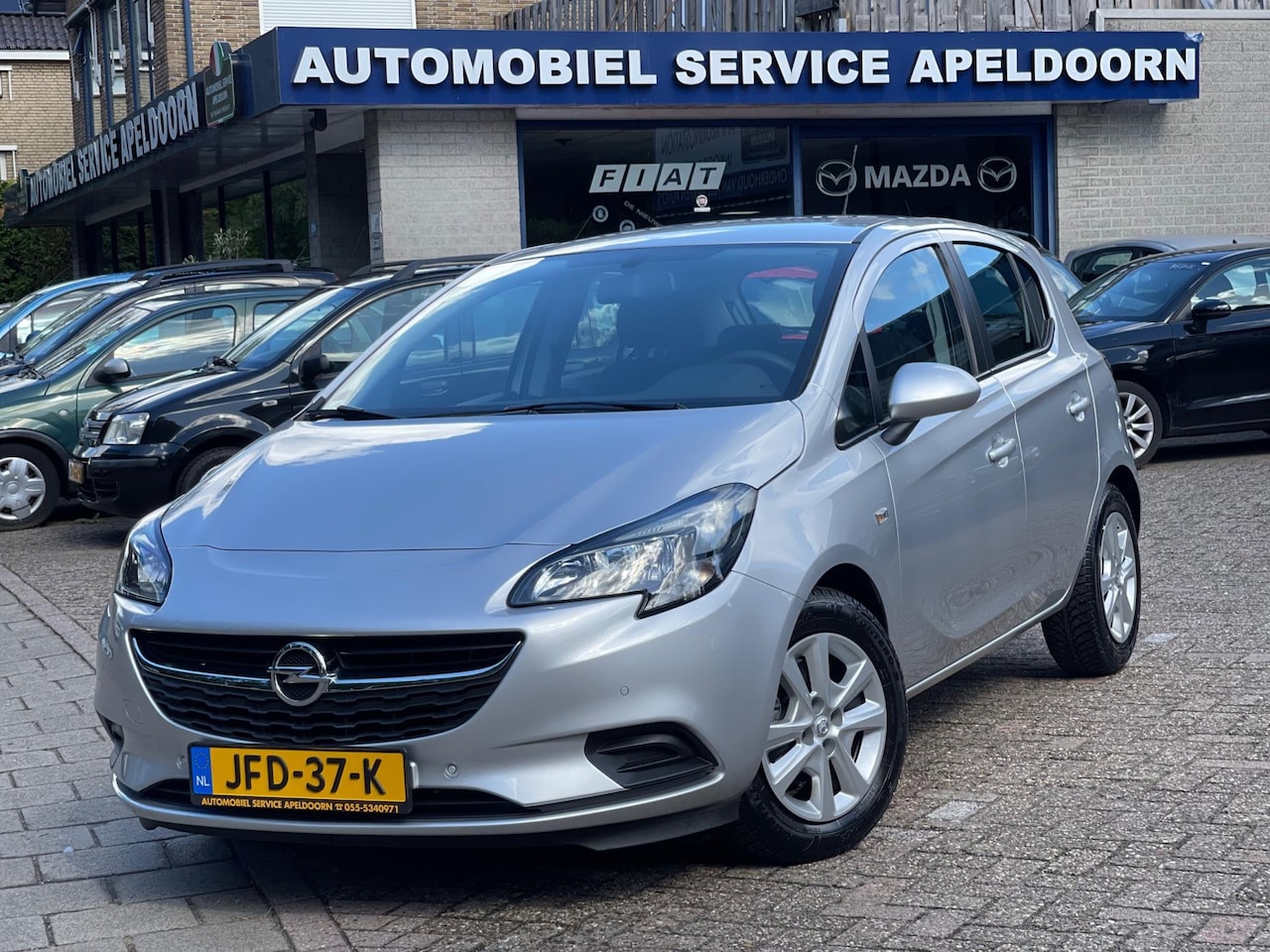 Opel Corsa - 1.2 Edition *5DRS*AIRCO*PDC*ELEKTR. RAMEN*STUURBEKR.*MULTIF. STUUR* - AutoWereld.nl