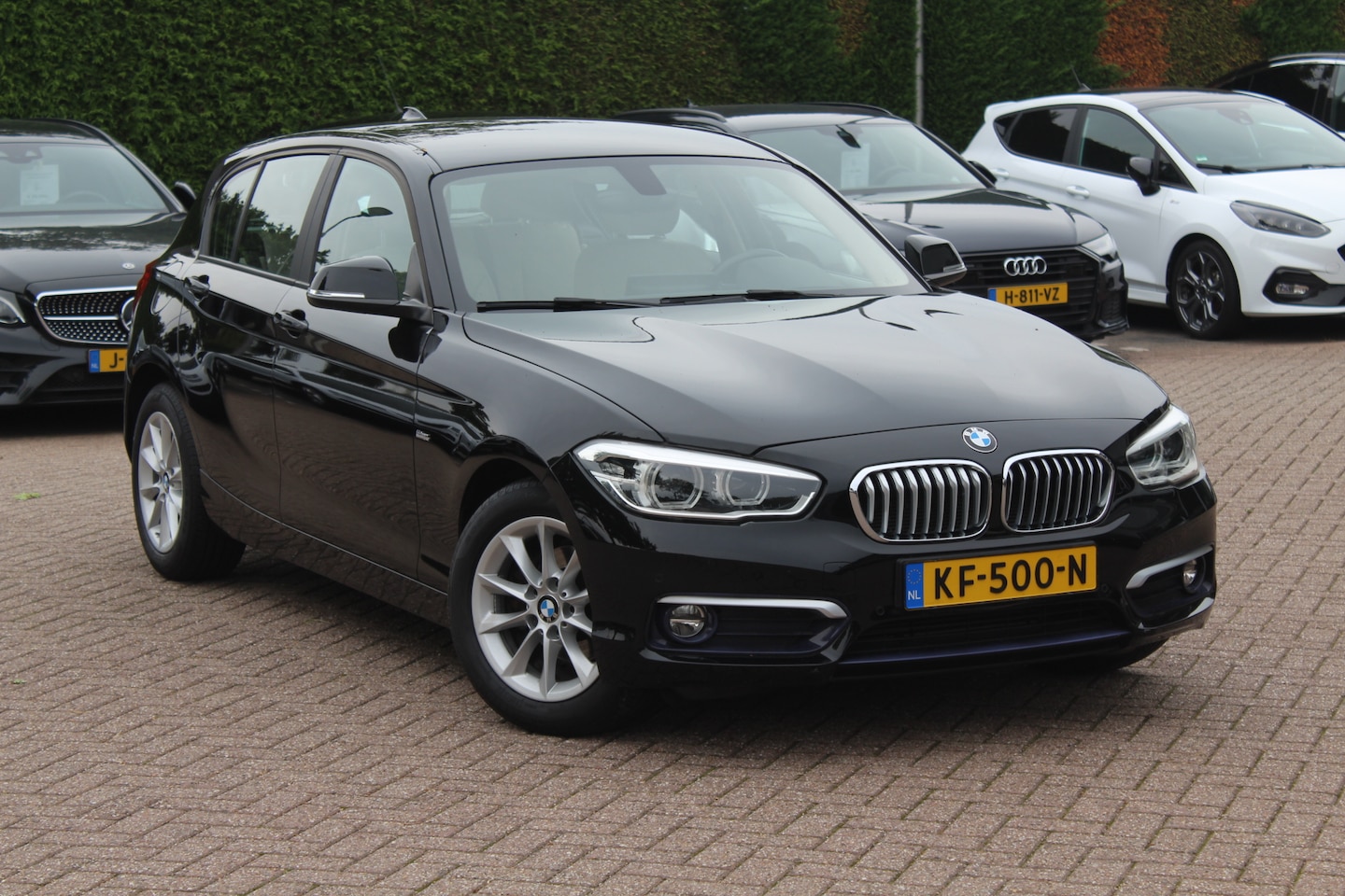 BMW 1-serie - 116i Centennial High Exe. / Dealer onderhouden / Leder / Navigatie / Parkeerhulp V+A / 16' - AutoWereld.nl