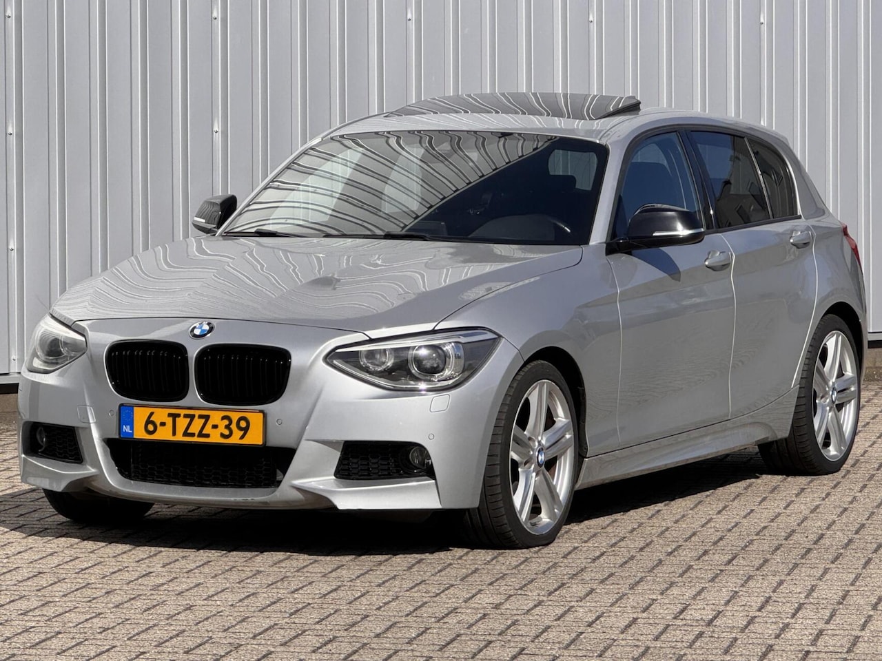 BMW 1-serie - 118i m pakket automaat inruil mogelijk - AutoWereld.nl