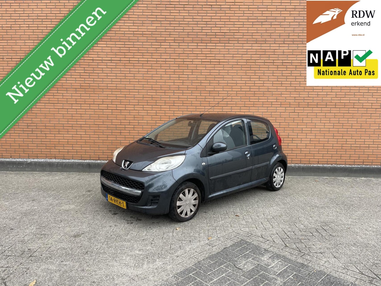 Peugeot 107 - 1.0 2011 137DKM | NAP | NAVI | AIRCO | APK | - AutoWereld.nl