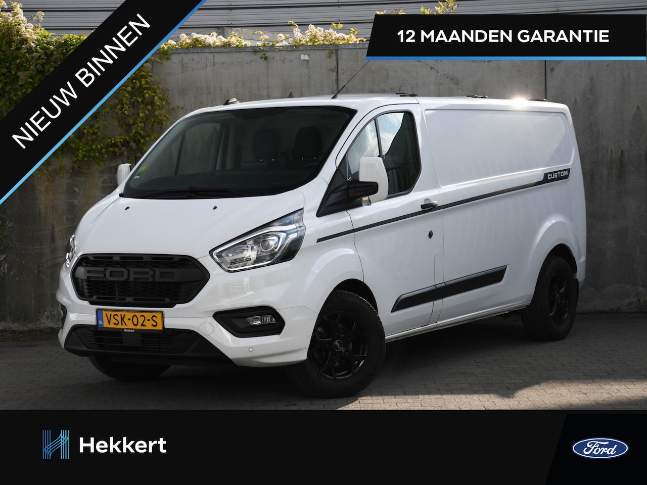Ford Transit Custom - 320 L2H1 2.0 TDCi 130pk PDC + CAMERA | DAB | CRUISE | AIRCO | APPLE-CARPLAY | TREKHAAK - AutoWereld.nl