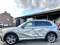 Volkswagen Tiguan - 1.4 TSI 150pk aut + f1 R-Line - pano - nap - massage - trekh - front + line assist - dynau
