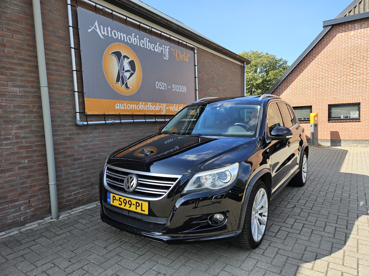 Volkswagen Tiguan - 2.0 TSI Sport&Style 4Motion - AutoWereld.nl