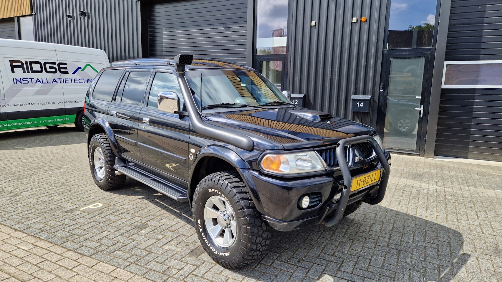 Mitsubishi Pajero Sport - 2.5 TDI Intense HR Airco - AutoWereld.nl