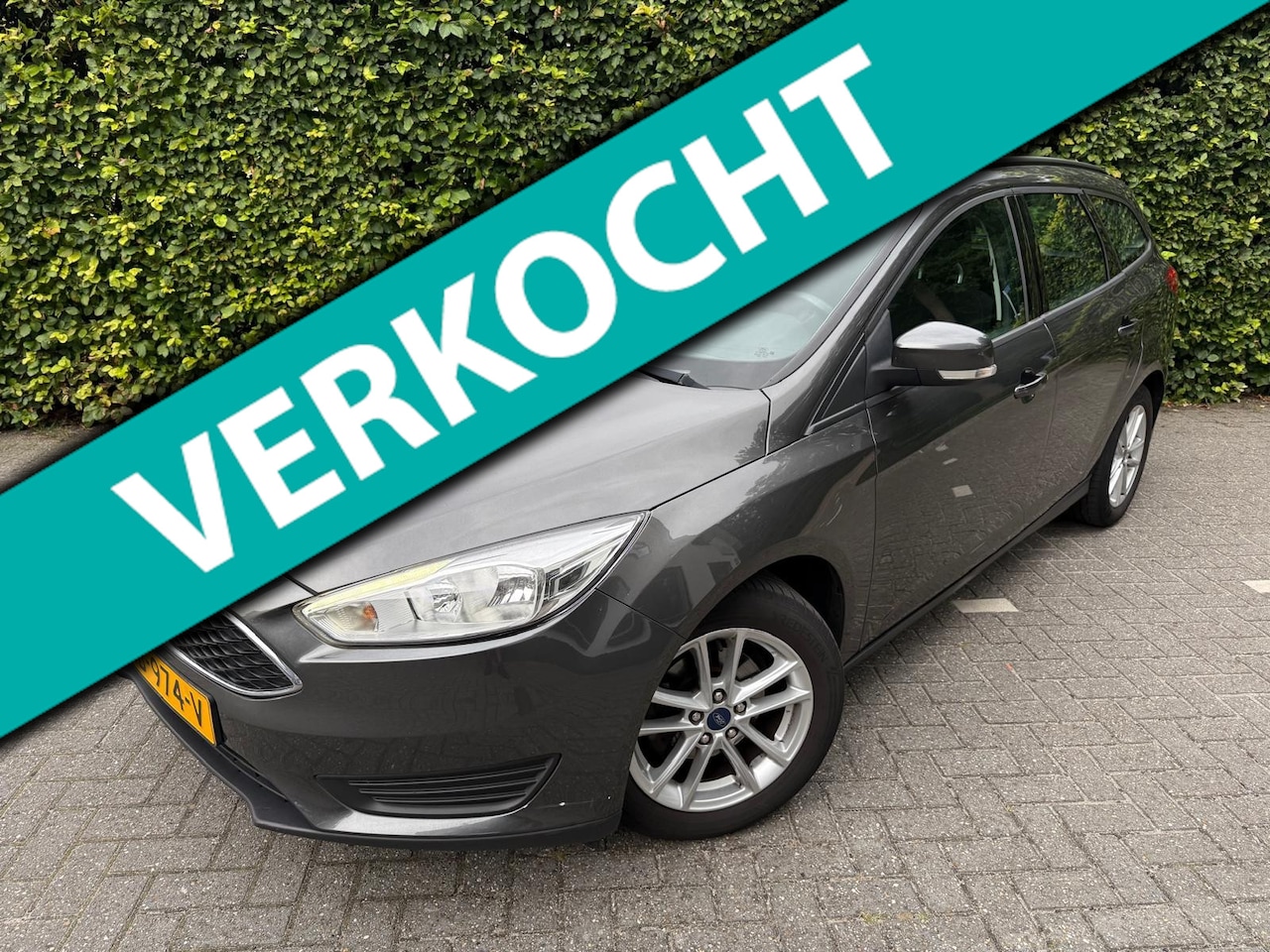 Ford Focus Wagon - 1.0 Turbo I Navigatie I Trekhaak - AutoWereld.nl