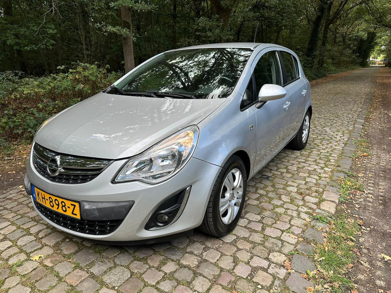 Opel Corsa - 1.2-16V Cosmo aico, navigatie nieuwe apk - AutoWereld.nl