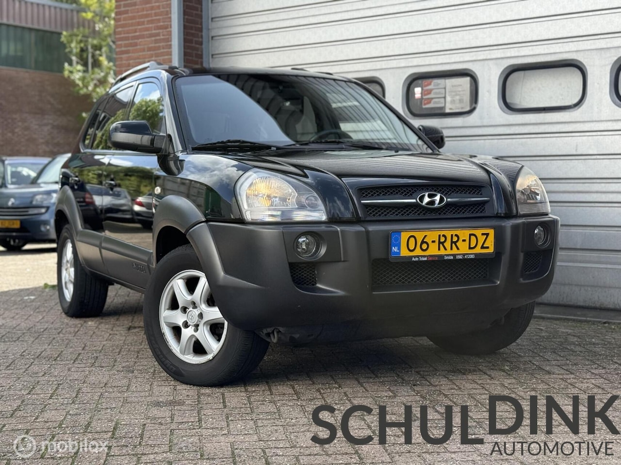 Hyundai Tucson - 2.0i Dynamic CRUISE CONTROLE|AIRCO|HOGE INSTAP - AutoWereld.nl
