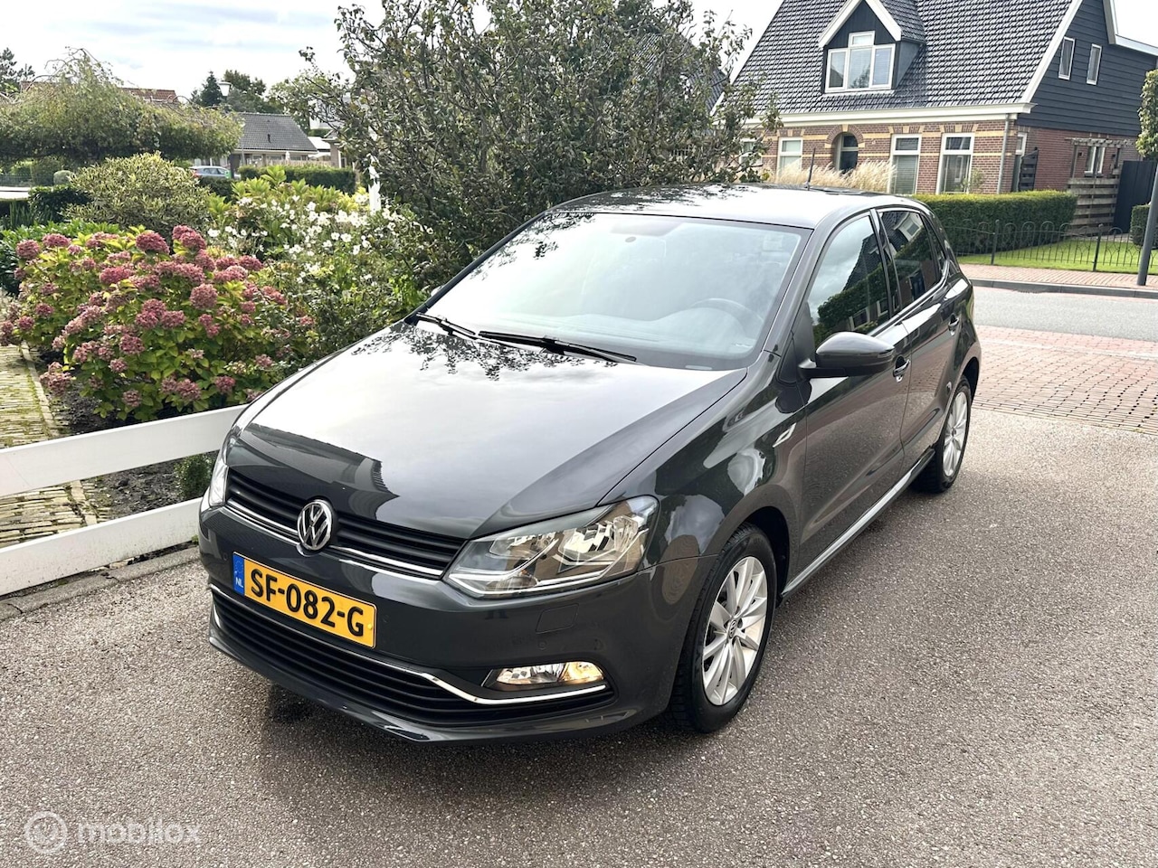 Volkswagen Polo - 1.0 5-DEURS COMFORTLINE AIRCO PARKEERSENSOREN STOELVERWARMING BLUETOOTH NETTE AUTO!! - AutoWereld.nl