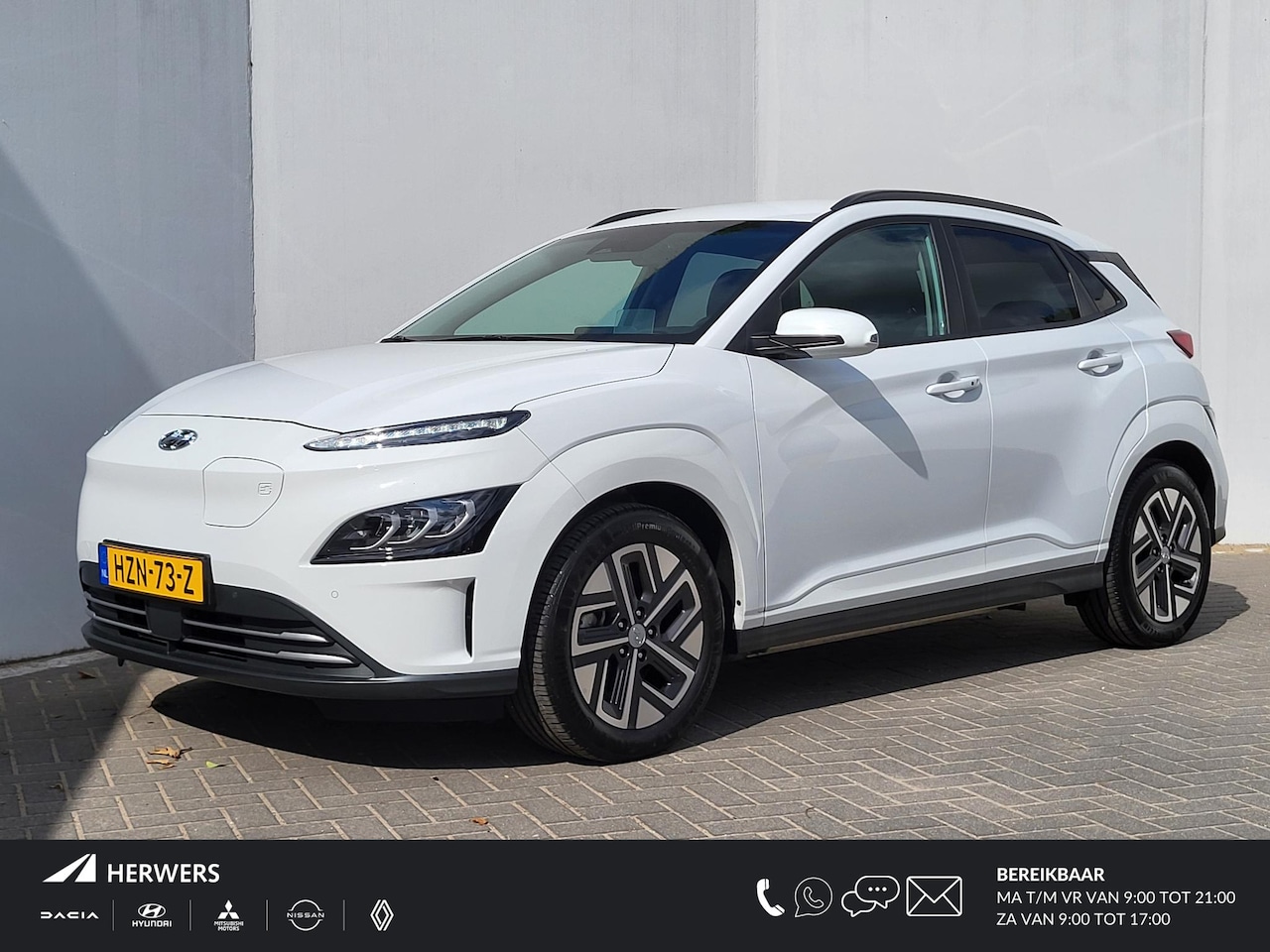 Hyundai Kona Electric - EV Business 64 kWh Automaat / Dealer onderhouden / HUD / Navigatie / Stuur- en stoelverwar - AutoWereld.nl