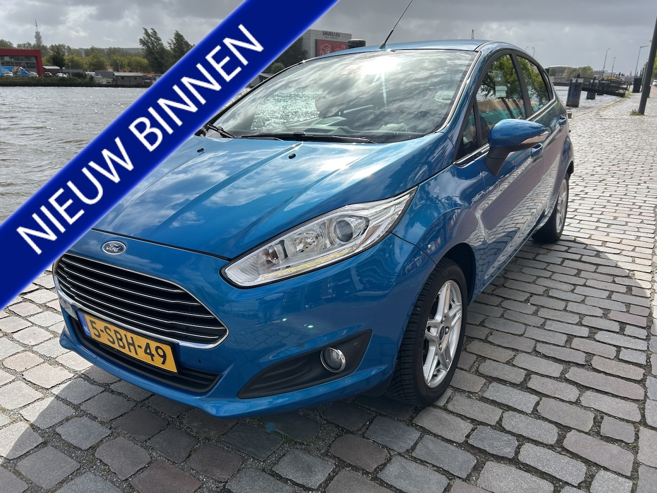 Ford Fiesta - 1.0 Titanium airco/ecc navigatie nwe apk - AutoWereld.nl