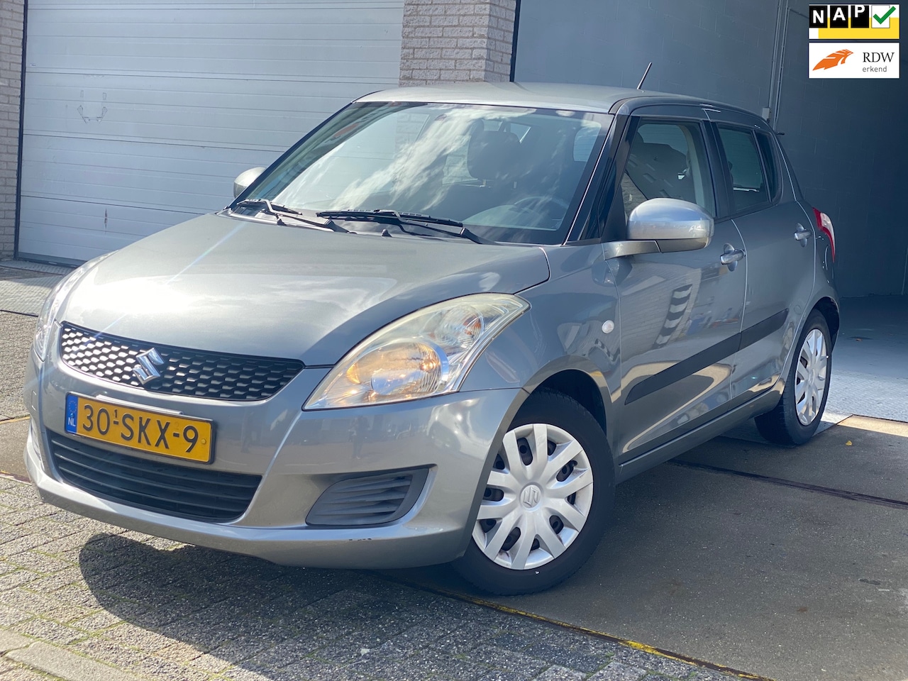 Suzuki Swift - 1.2 Comfort EASSS/5drs/nap/2e EIG/ 1jaar apk/ dealeronderhouden/ airco/ EL-ramen/ zeer net - AutoWereld.nl