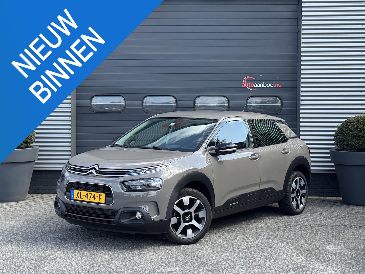 Citroën C4 Cactus - 1.2 PureTech Feel | Navigatie | Camera | Lichtmetalen Velgen | DAB | - AutoWereld.nl