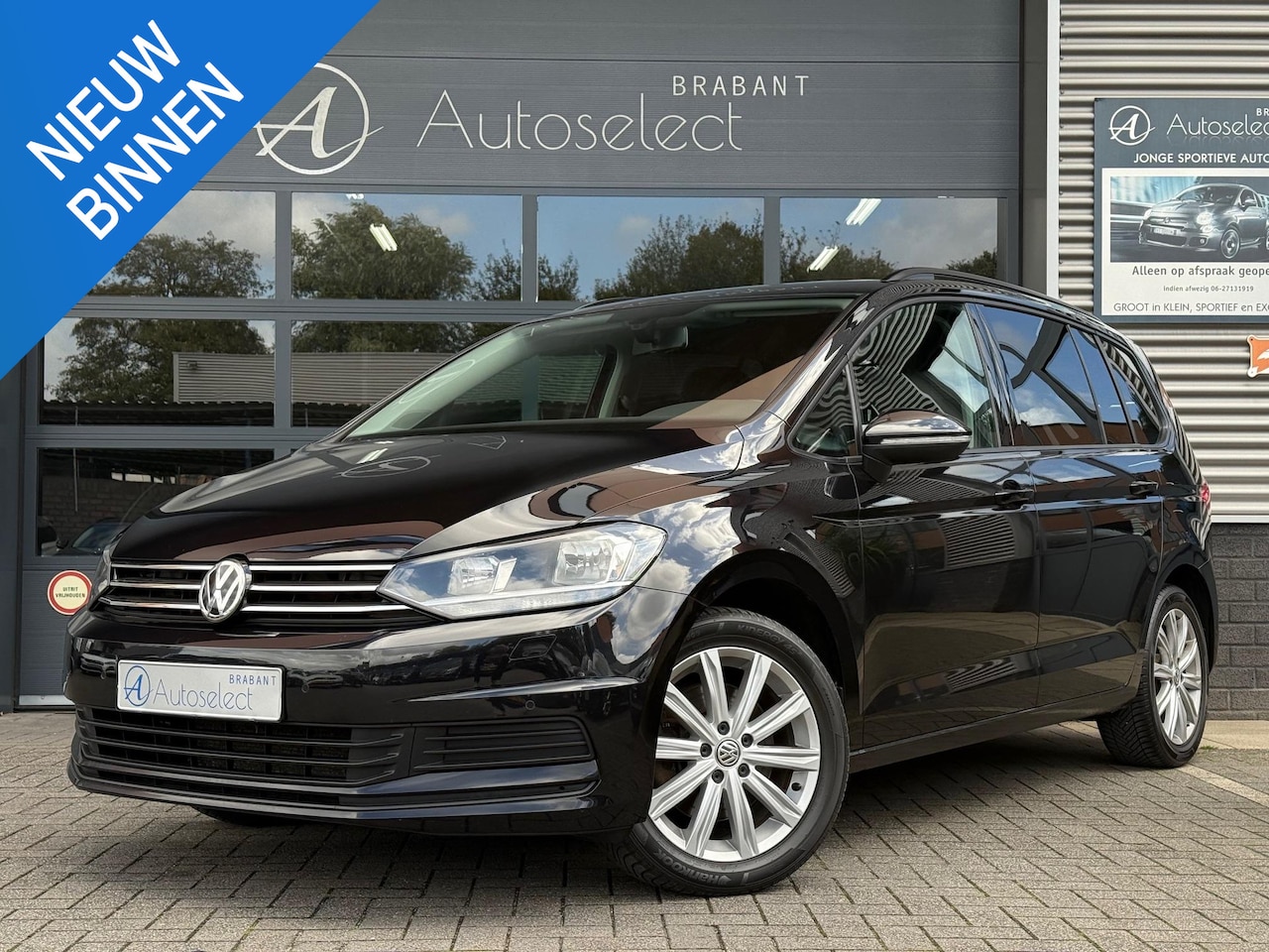Volkswagen Touran - 1.2 TSI Comfortline 7p Clima PDC LMV - AutoWereld.nl