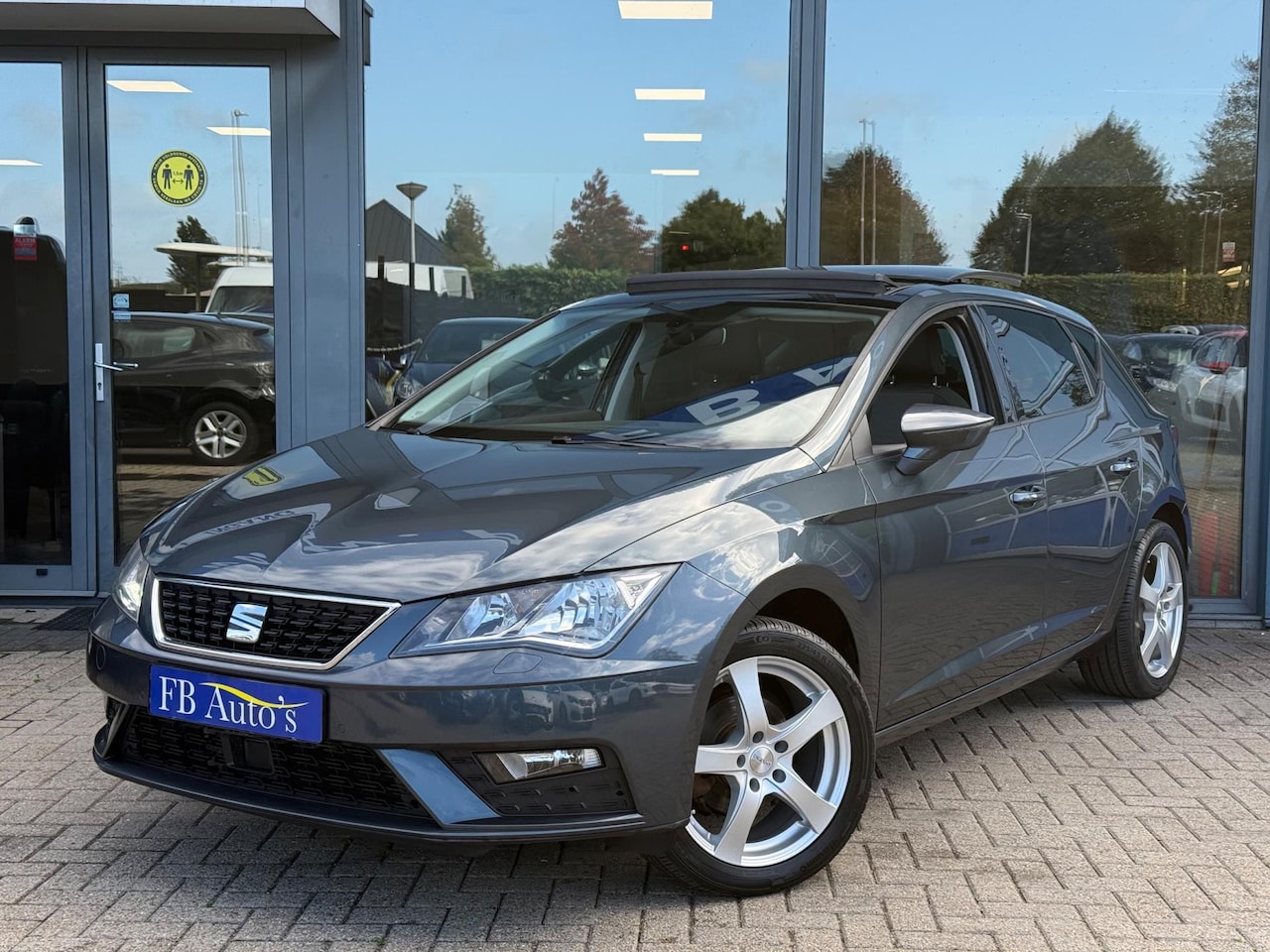 SEAT Leon - 1.0 TSI Style Airco Lmv Pano Navi Cruise - AutoWereld.nl