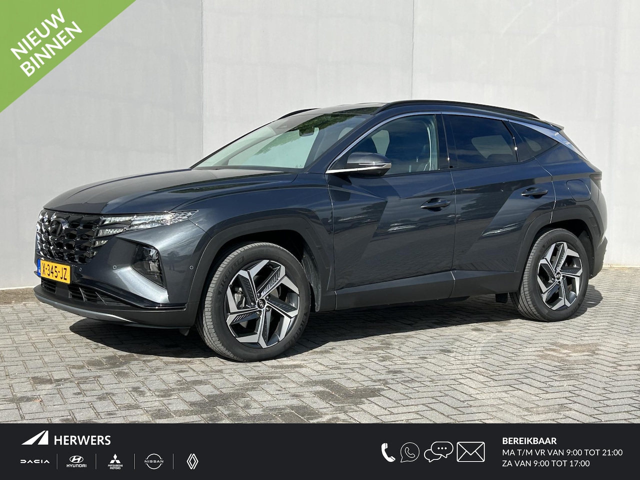 Hyundai Tucson - 1.6 T-GDI PHEV Premium 4WD / Trekhaak ( 1.350 KG ) / Lederen bekleding / Elektrische koffe - AutoWereld.nl
