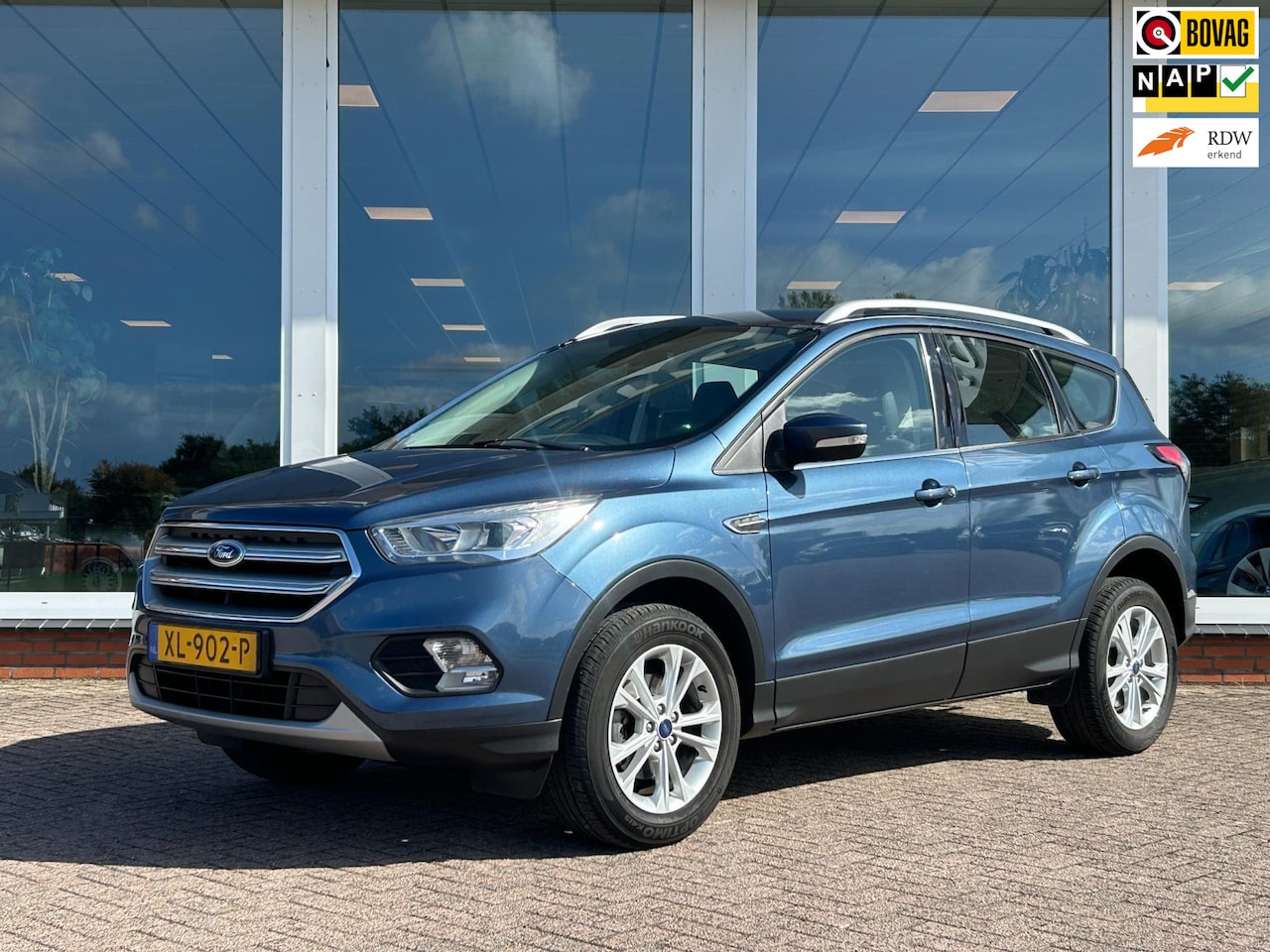 Ford Kuga - 1.5 EcoBoost Titanium Origineel NL - NAP - Leder - Navi - Camera - Trekhaak - AutoWereld.nl