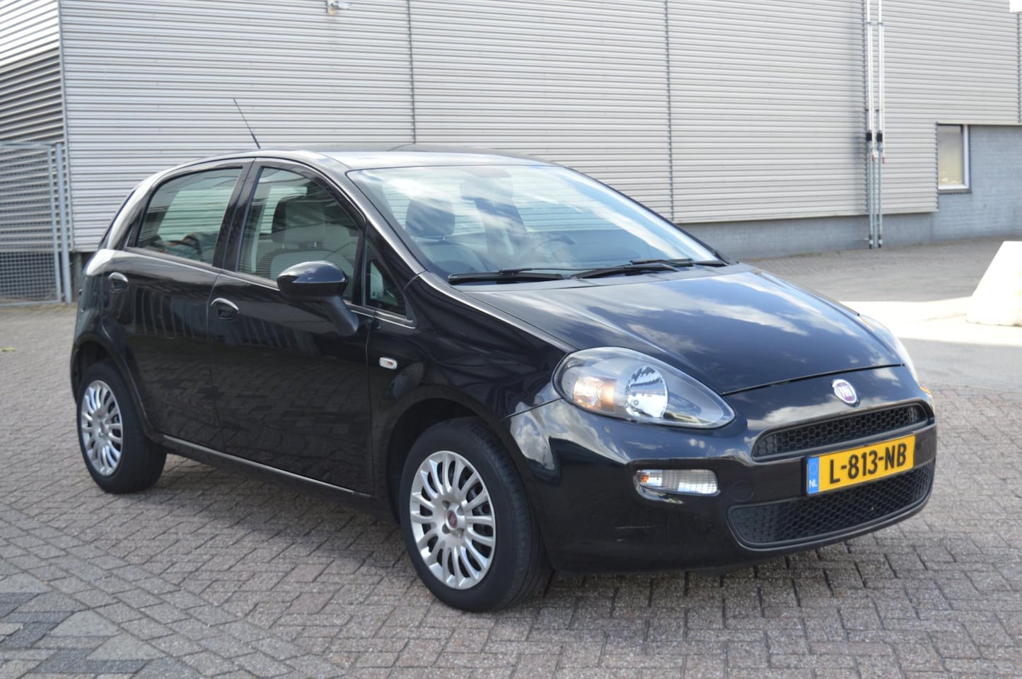 Fiat Punto Evo - 1.2 Pop bj12 airco elec pak lage kmstand - AutoWereld.nl