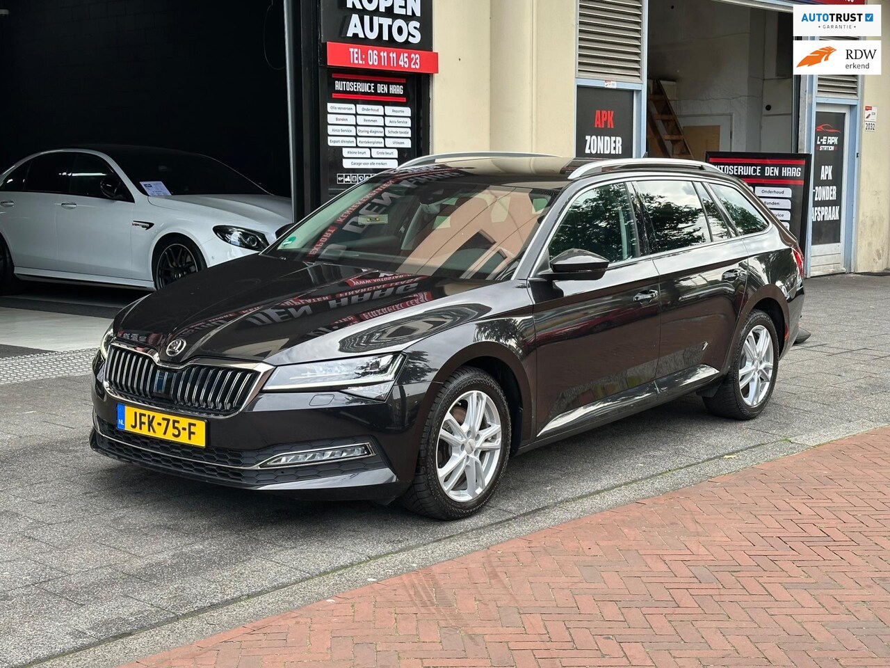 Skoda Superb Combi - 2.0 TSI DSG 140Kw Navi Carplay Memory - AutoWereld.nl