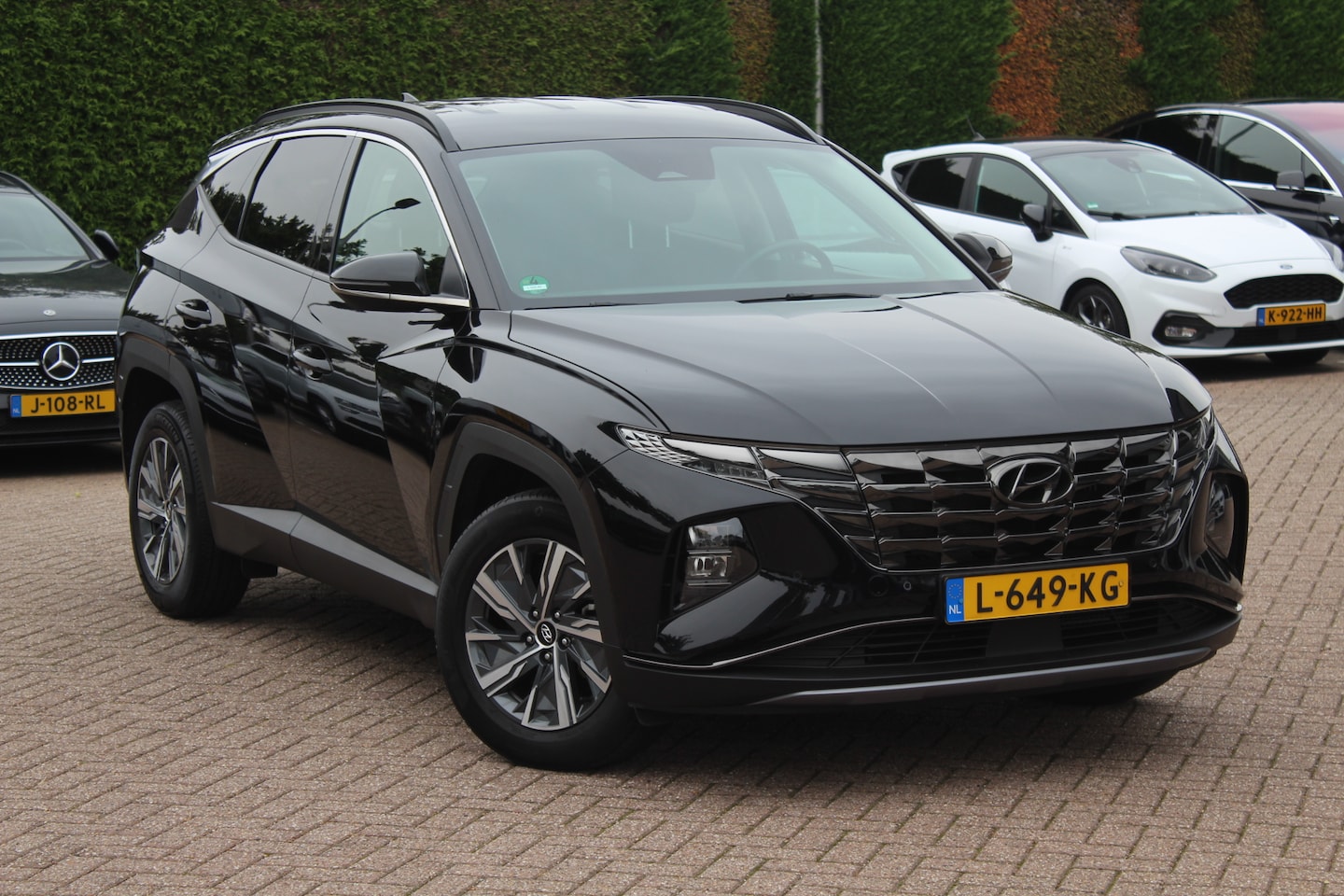 Hyundai Tucson - 1.6 T-GDI HEV Comfort Smart / Camera / Navigatie / Keyless / 19'' / LED / DAB / Stuur+Stoe - AutoWereld.nl