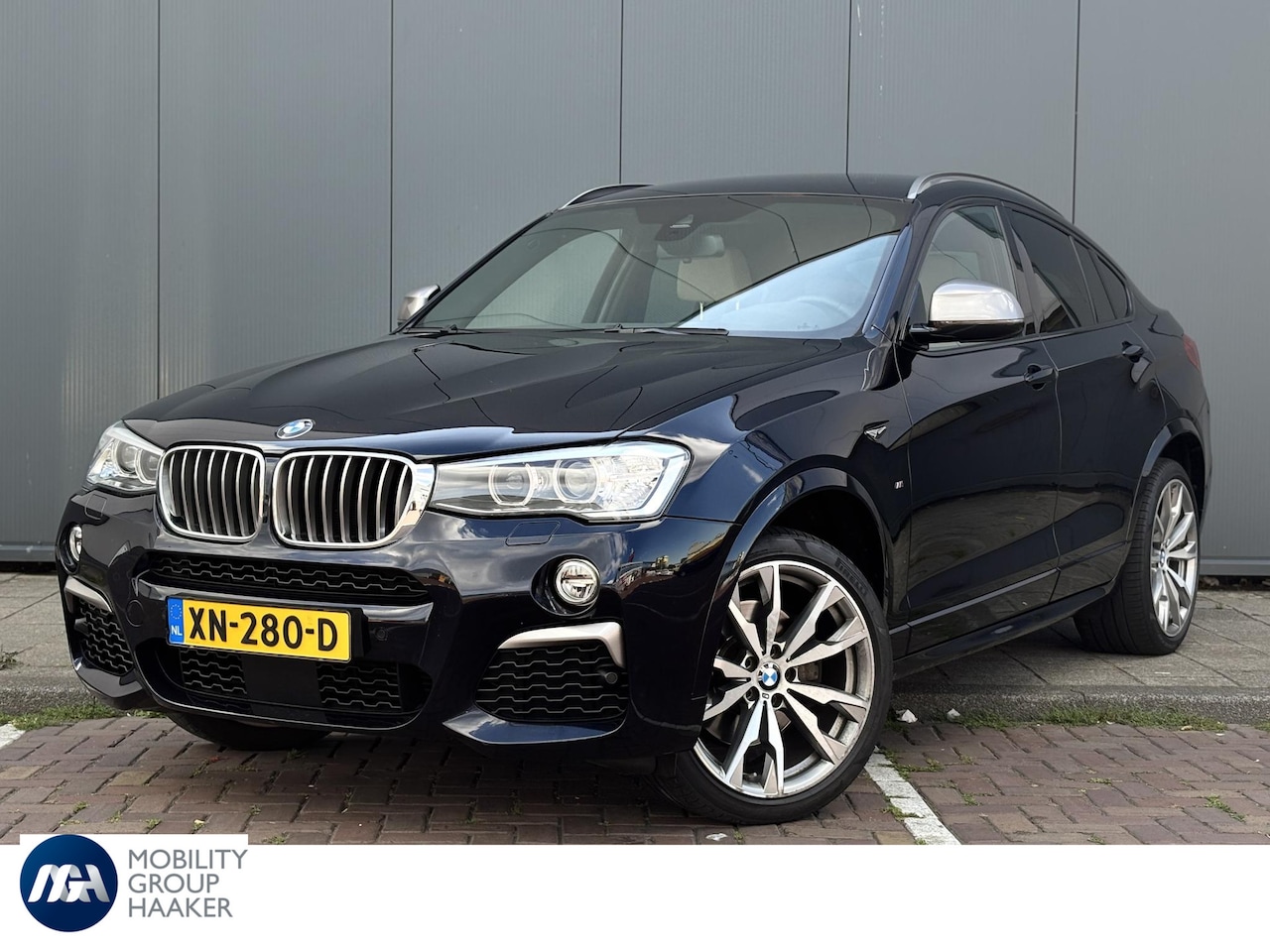 BMW X4 - M40i High Executive | Carbon Black | Trekhaak | Apple-Android | Stoelverwarming | Adaptiev - AutoWereld.nl
