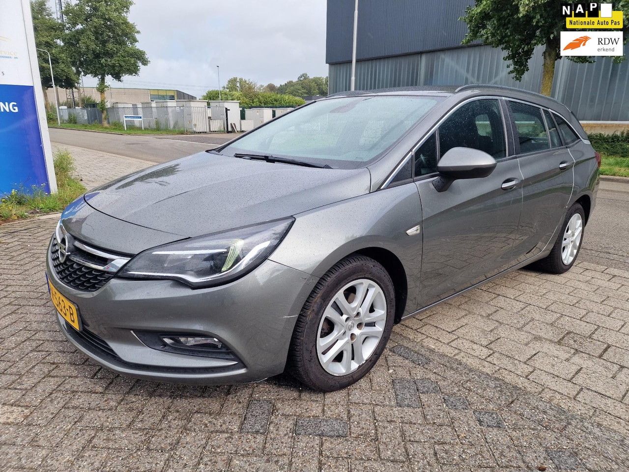 Opel Astra Sports Tourer - 1.6 CDTI Business 1.6 CDTI Business+, Distributie ketting maakt geluid, Inruil mogelijk. - AutoWereld.nl