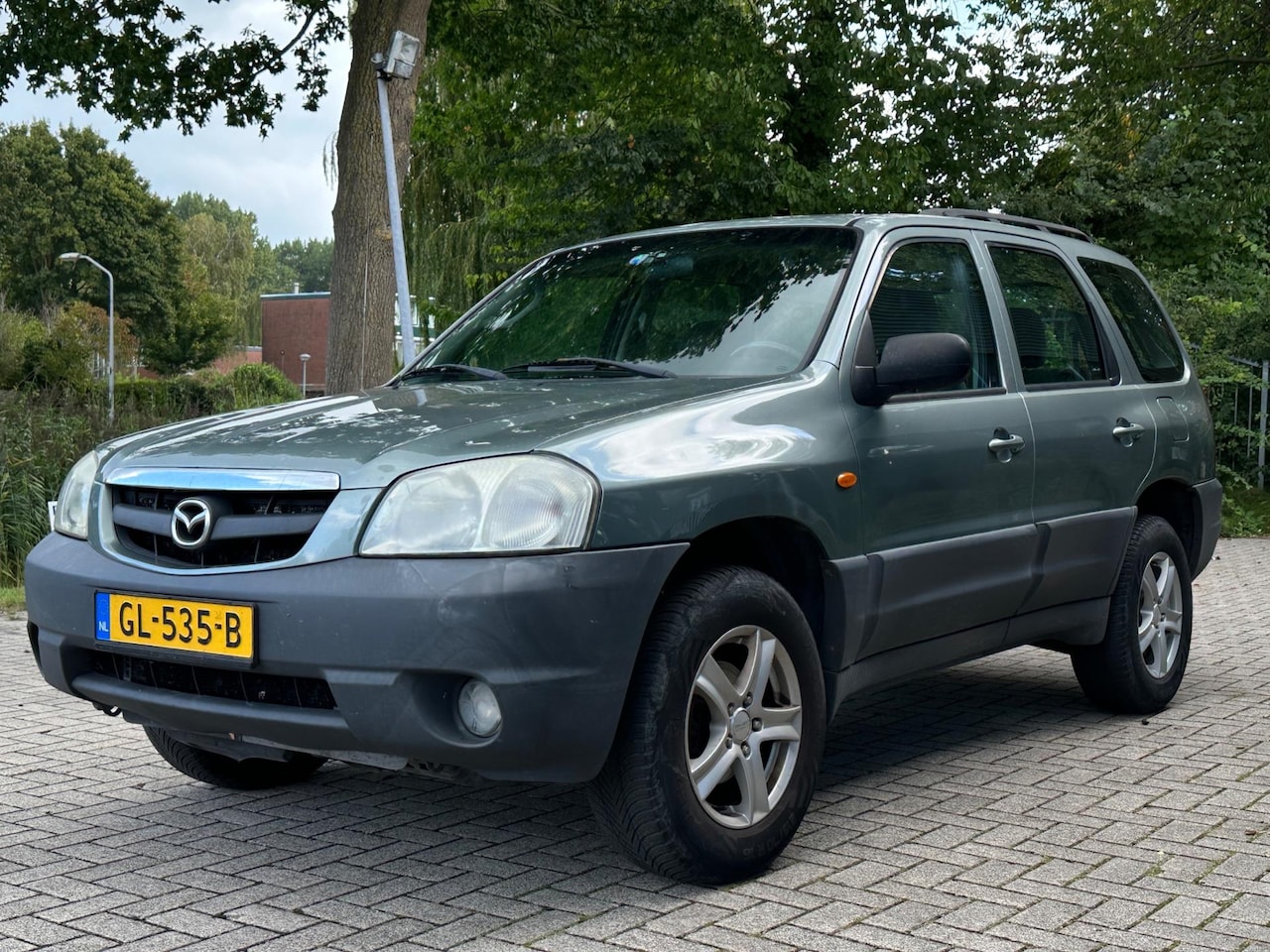 Mazda Tribute - 2.0 Touring 4WD 2.0 Touring 4WD - AutoWereld.nl
