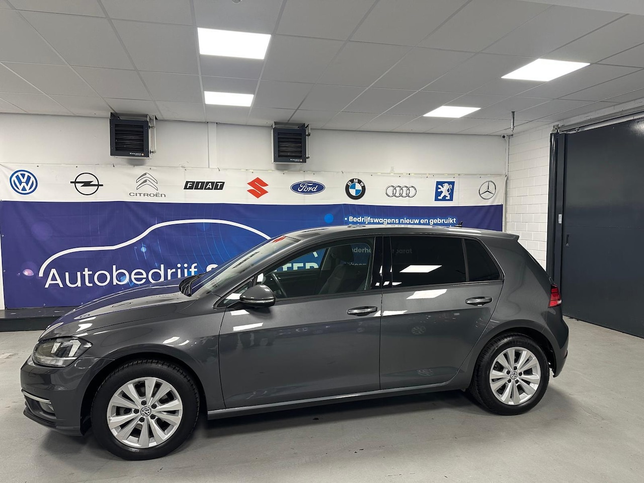 Volkswagen Golf - 1.0 TSI Trendline camera/cruise/airco - AutoWereld.nl