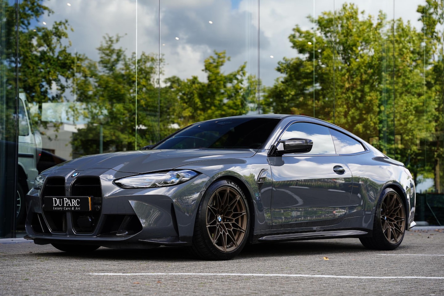BMW 4-serie Coupé - M4 X-Drive Competition Individual Grigio Telesto, Mosselman, R44, Eventuri - AutoWereld.nl