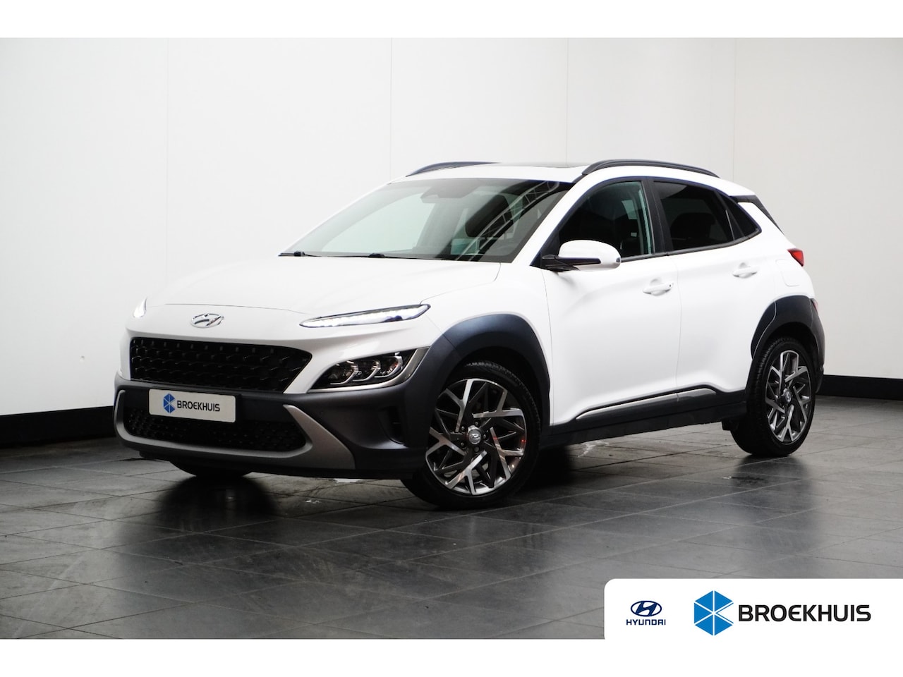 Hyundai Kona - 1.6 GDI HEV Fashion Design Sky 140pk | Schuif-/Kanteldak | Vol-Leder | Stoelverwarming | C - AutoWereld.nl