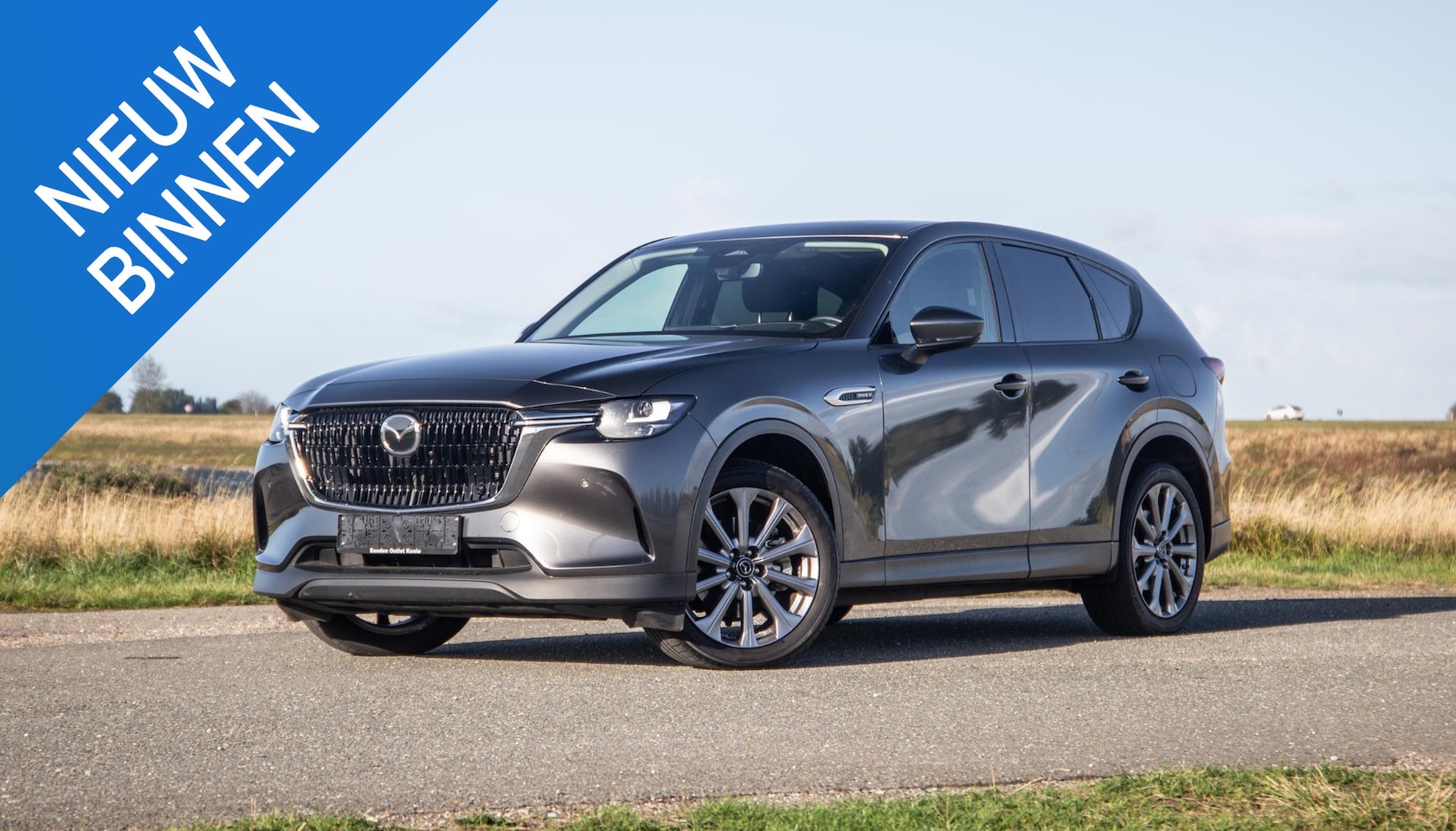 Mazda CX-60 - 2.5 e-SkyActiv PHEV Exclusive-Line CARPLAY / PANORAMA DAK / ADAPTIVE CRUISE / NAVI / TREKH - AutoWereld.nl