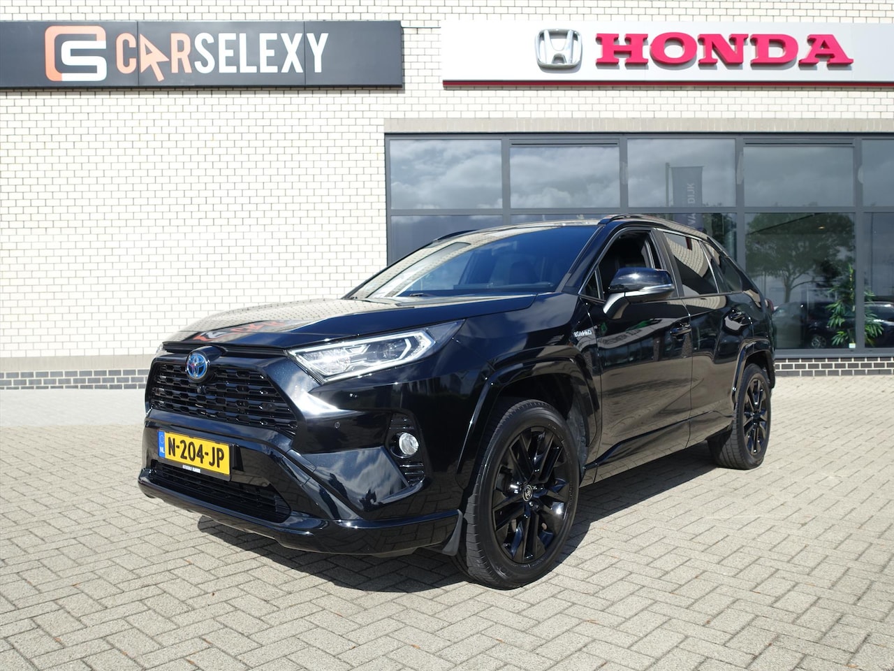 Toyota RAV4 - 2.5 Hybrid 222pk CVT Black Edition, maar 19.123 km en trekhaak / 1650 kg trekgewicht! - AutoWereld.nl