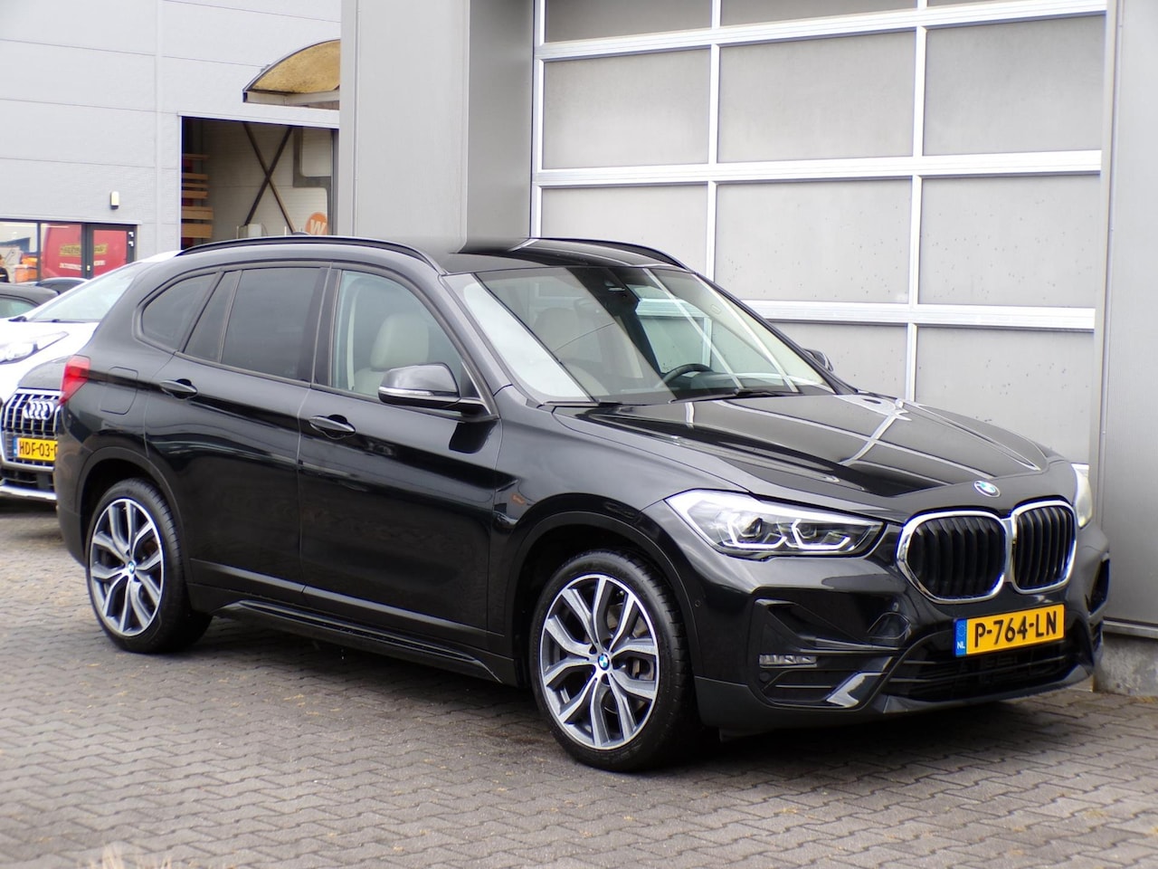 BMW X1 - XDrive25e High Executive|LED|Navi|Leder|Cruise|PDC|BT - AutoWereld.nl