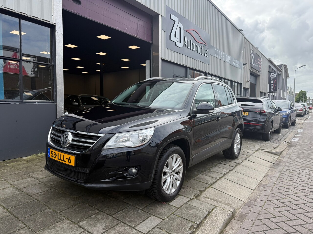 Volkswagen Tiguan - 1.4 TSI Sport&Style Lage KM NAP - AutoWereld.nl