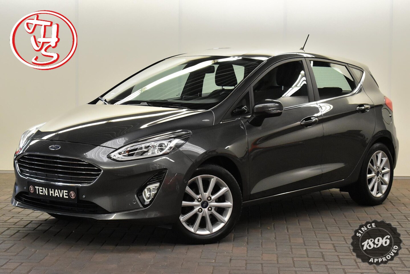 Ford Fiesta - 1.0 EcoBoost Titanium CAMERA|TREKHAAK|CARPLAY|SENSOREN - AutoWereld.nl
